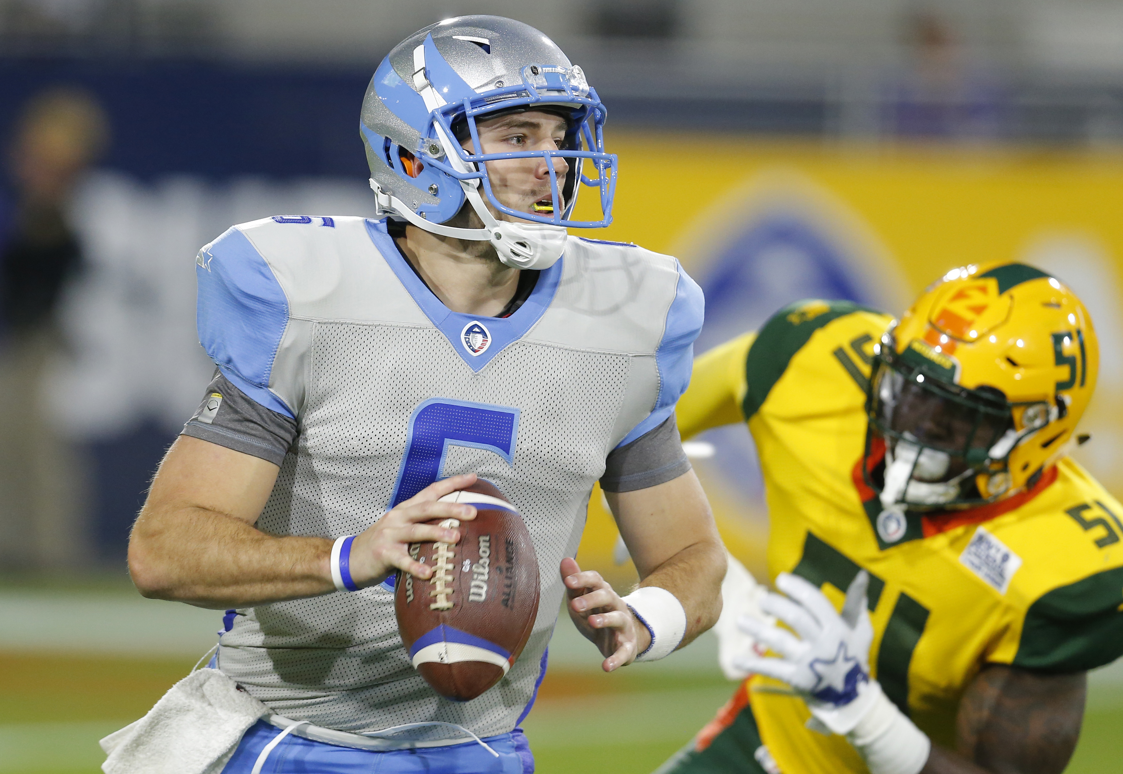 Salt Lake Stallions quarterback gets pressured by Arizona Hotshots linebacker Edmond Robinson (51) in the first half during an AAF football game Sunday, Feb. 10, 2019, in Tempe, Ariz. (Photo: Rick Scuteri, AP)