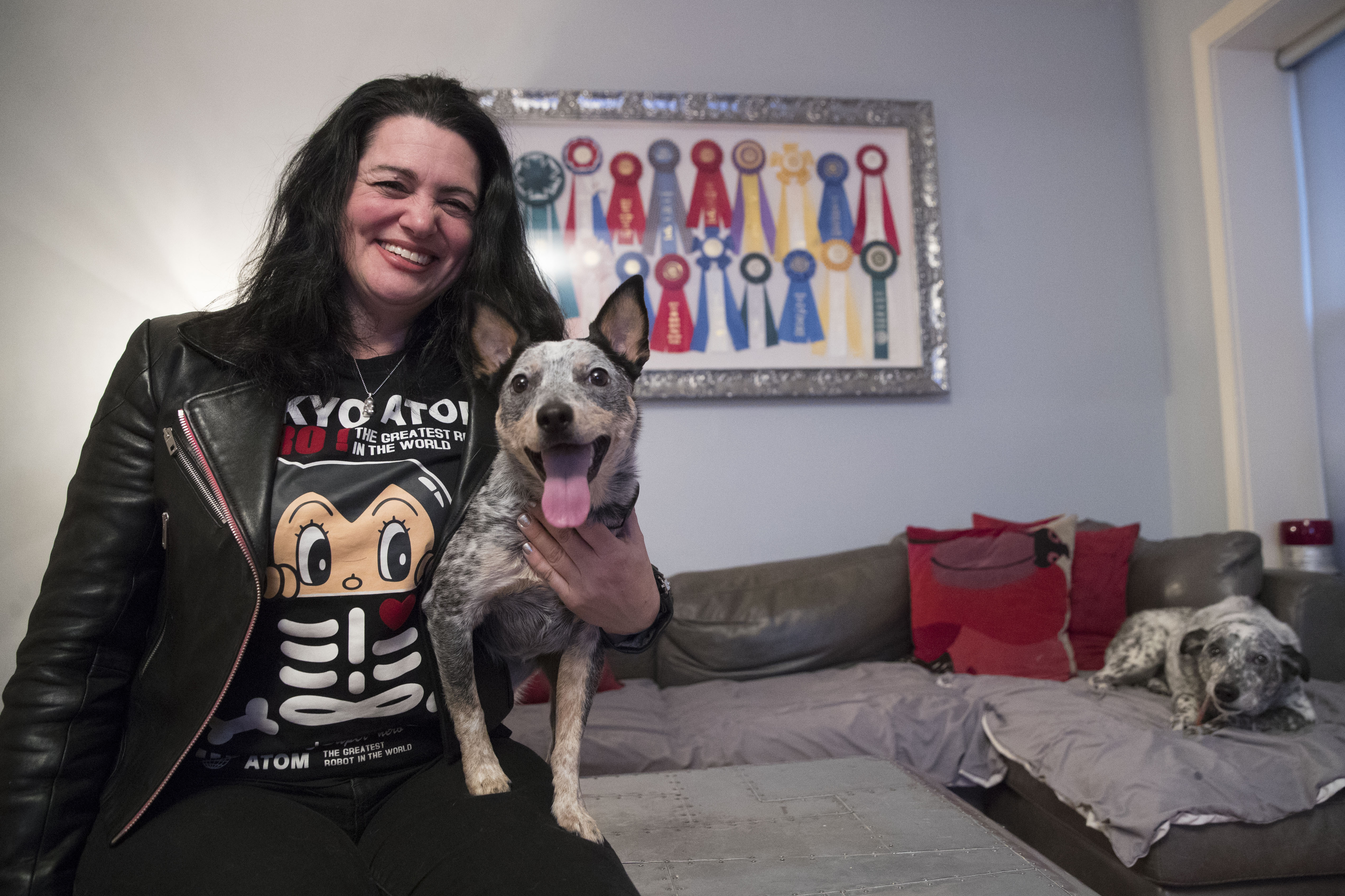In this Thursday, Jan. 31, 2019, photo Lisa Topol poses for a photo with her two rescue dogs, Schmutzy, right, and Plop, in New York. Photo: Mary Altaffer, AP Photo