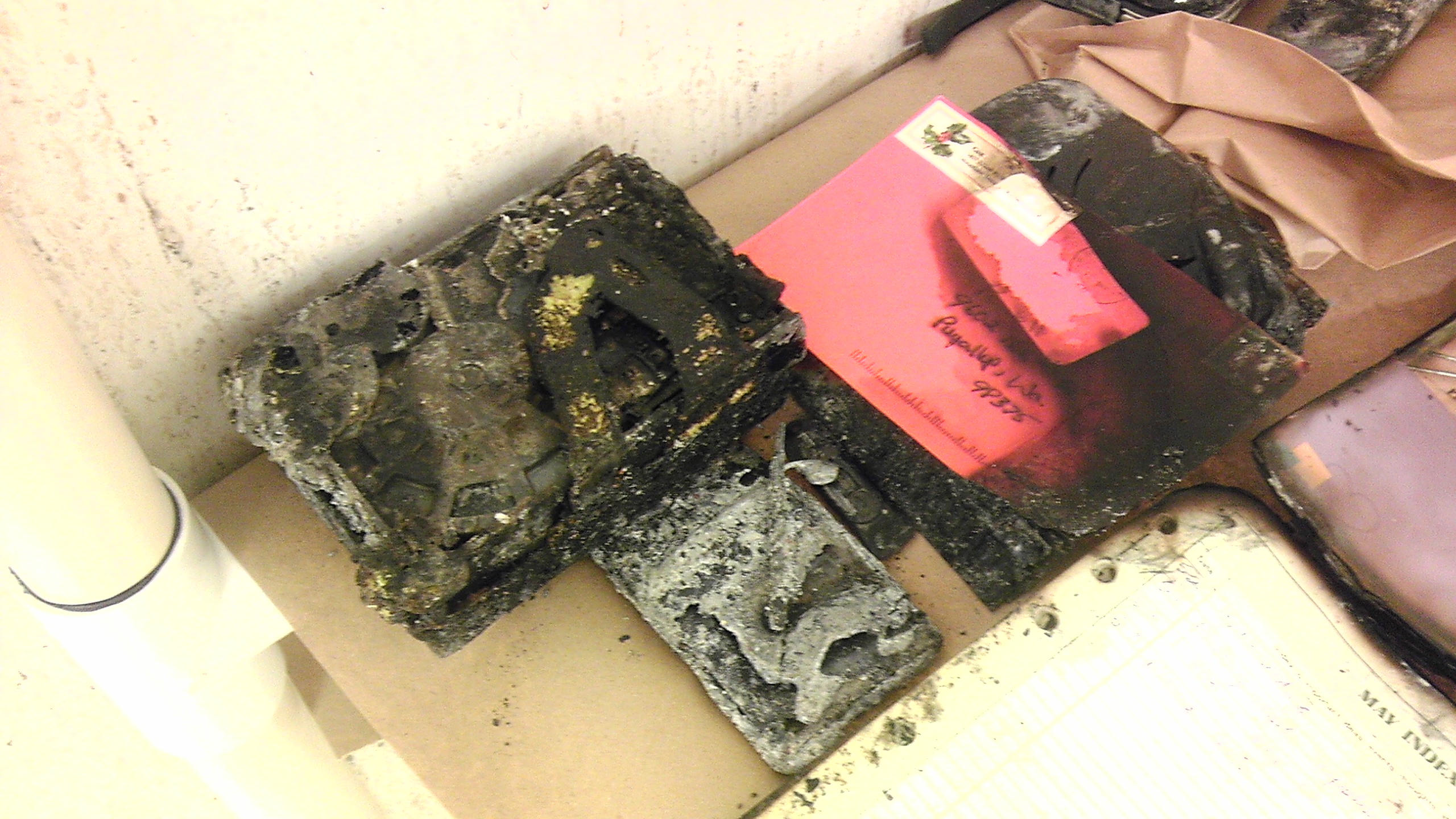 West Valley police sent these three burned hard drives located in Josh Powell's rented home following a fatal fire on Feb. 5, 2012, to the FBI for analysis. The two larger 3.5-inch drives had melted together. The FBI was not able to extract any data from the drives. (Photo: West Valley City Police Department, File)