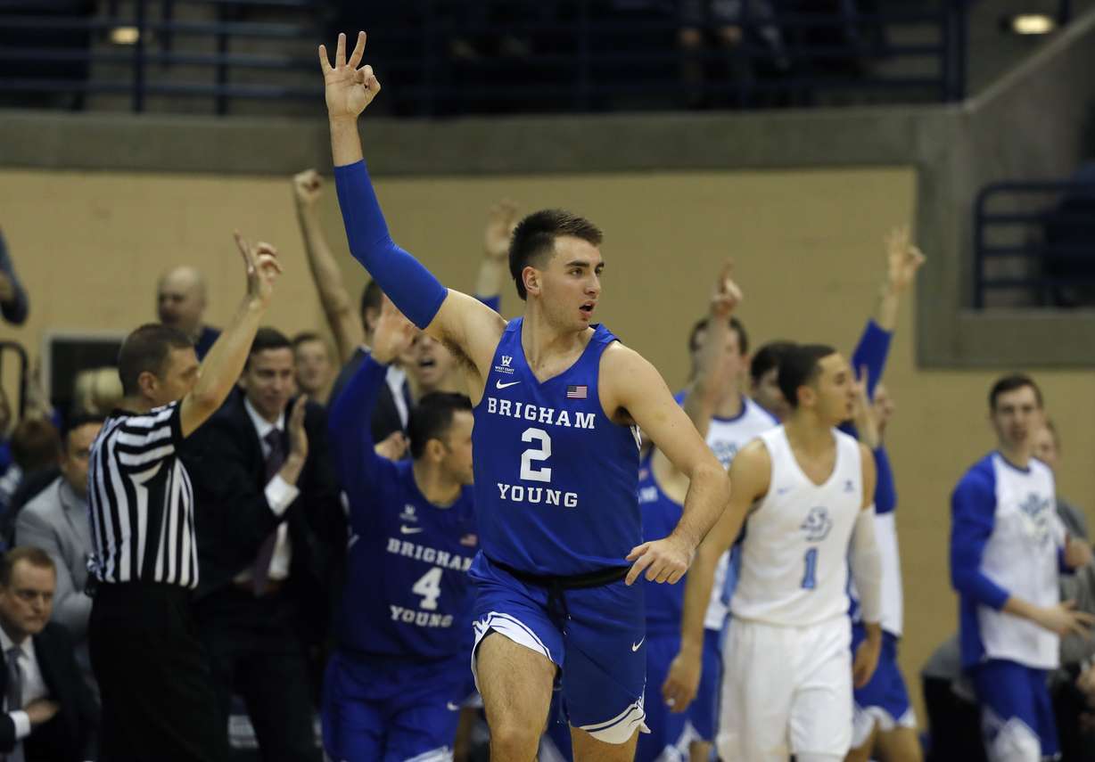 Brigham Young guard Zac Seljaas reacts after making a three-point shot during the second half of an NCAA college basketball game against San Diego, Thursday, Feb. 14, 2019, in San Diego. (Photo: Gregory Bull, AP)