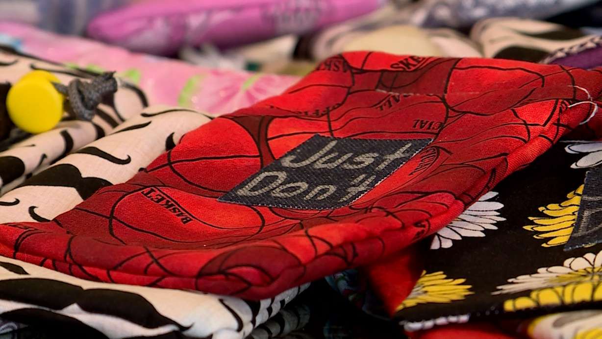 Logan Merrill designed "Just Don't" bags for drivers to keep their cell phone in while behind the wheel to eliminate distraction. (Photo: KSL TV)