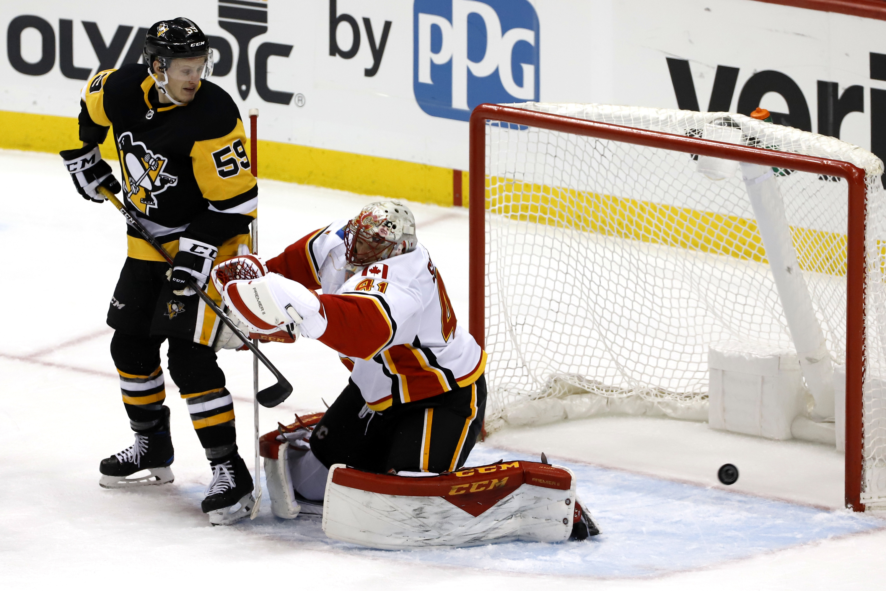 Flames snap 4-game skid, beating Penguins 5-4
