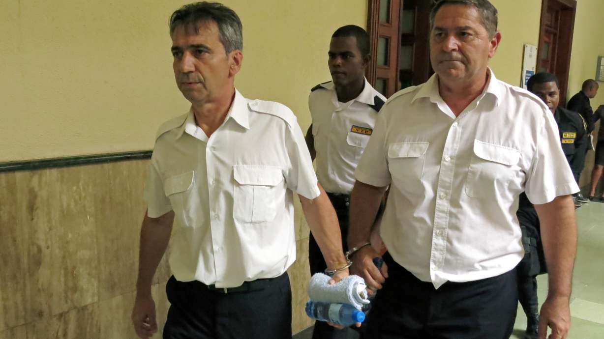 2 French pilots who fled Dominican Republic go on trial