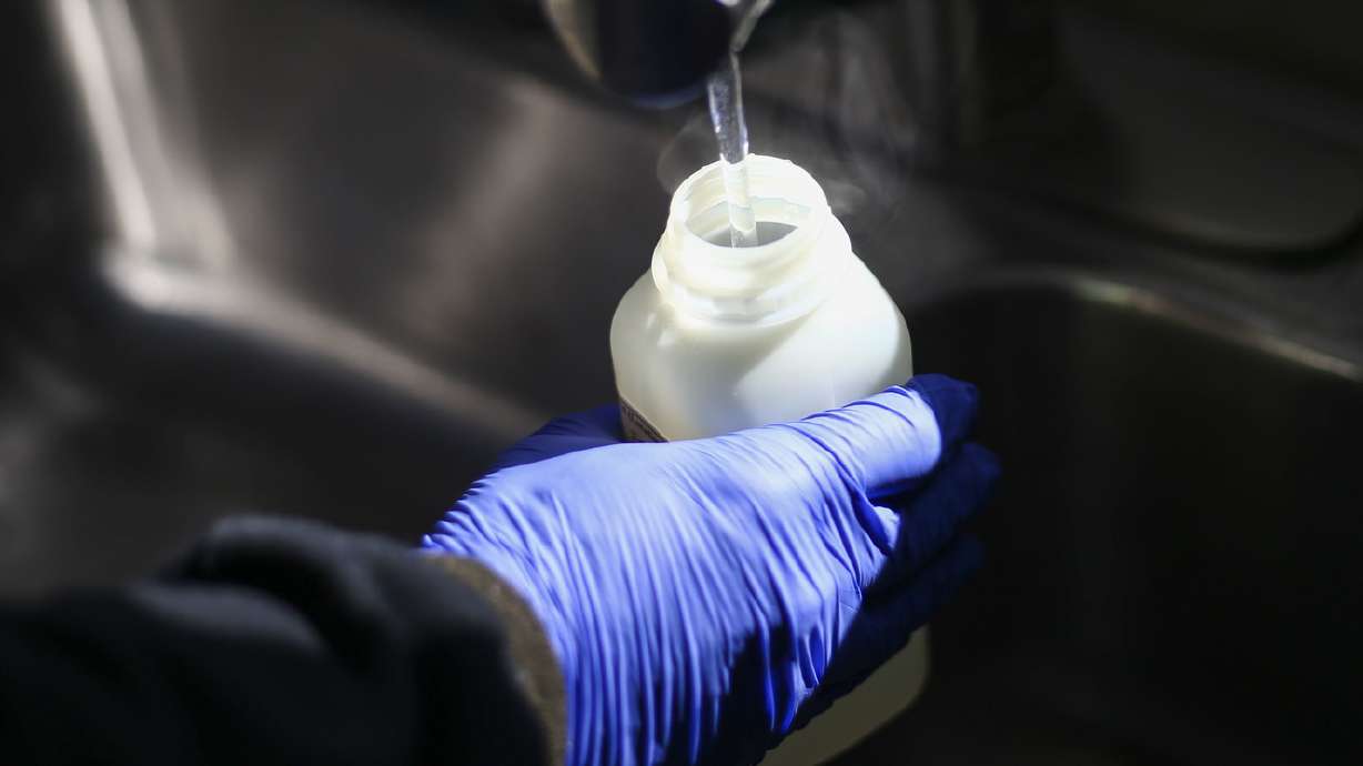 Salt Lake County Health Department employee takes water samples on Feb. 18, 2019. Sunset City and Pleasant Grove both experienced issues with water contamination on Wednesday. Residents in those areas should take care before drinking water from the tap.