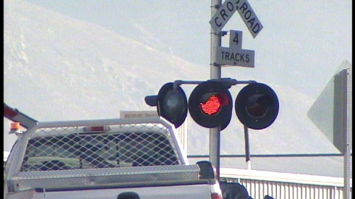 School Bus Stuck on Train Tracks