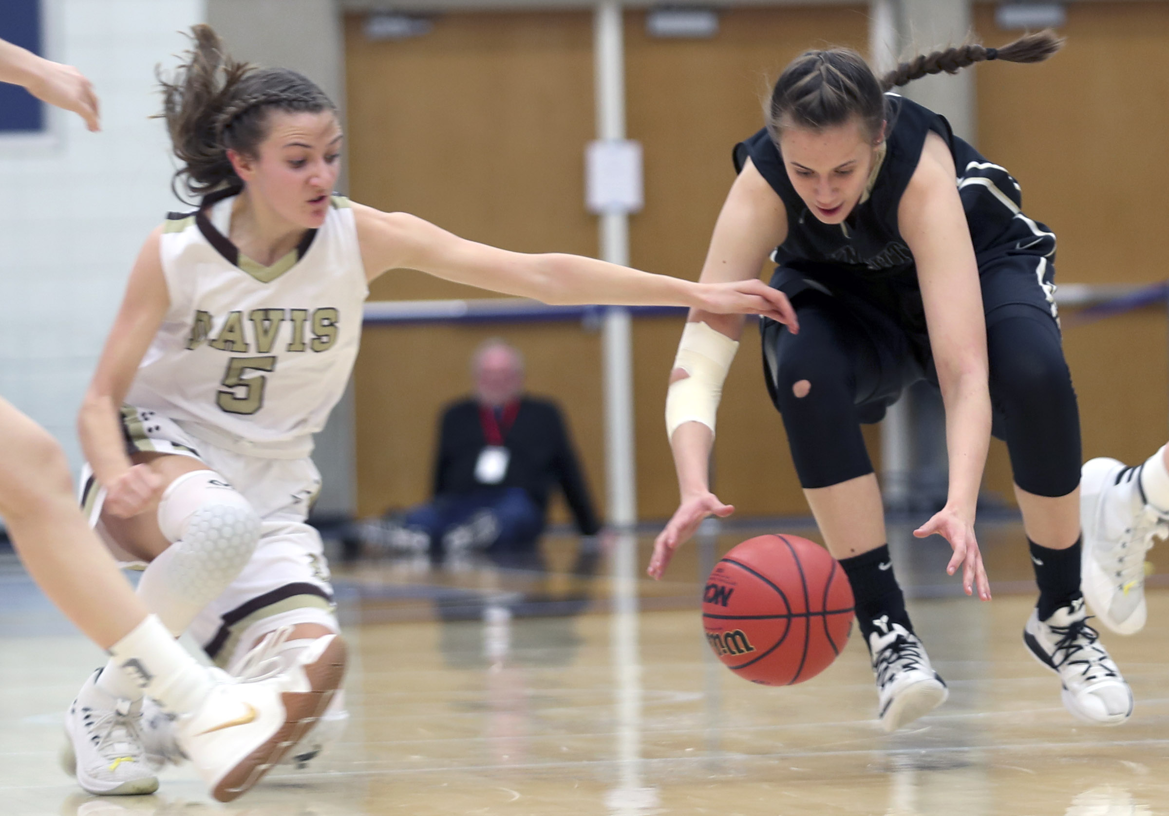 Action in the high school girls basketball 6A first round game between Lone Peak and Davis at the Lifetime Activities Center on the SLCC campus in Taylorsville on Monday, Feb. 18, 2019. (Steve Griffin, KSL)