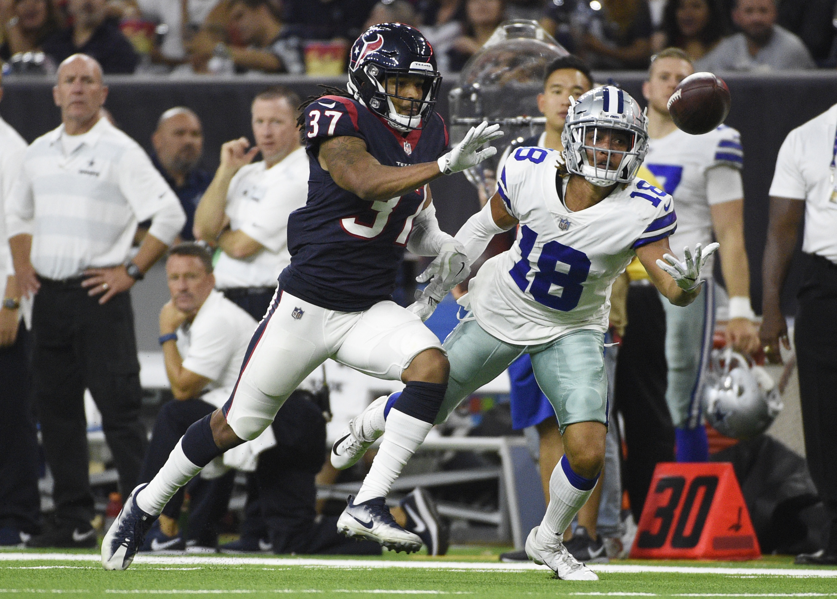 Houston Texans defensive back Andre Chachere (37) breaks up a pass intended for Dallas Cowboys wide receiver Dres Anderson (18) during the second half of a preseason NFL football game Thursday, Aug. 30, 2018, in Houston. (Photo: Eric Christian Smith, AP)