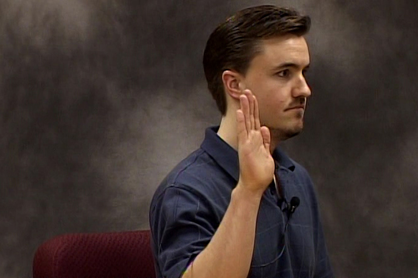 Michael Powell sat for a sworn deposition in Tacoma, Wash., on Oct. 20, 2012, as part of ongoing litigation over his brother Josh Powell's life insurance policies. The deposition was video recorded. (Photo: Patrick Norton, Seattle Deposition Reporters)