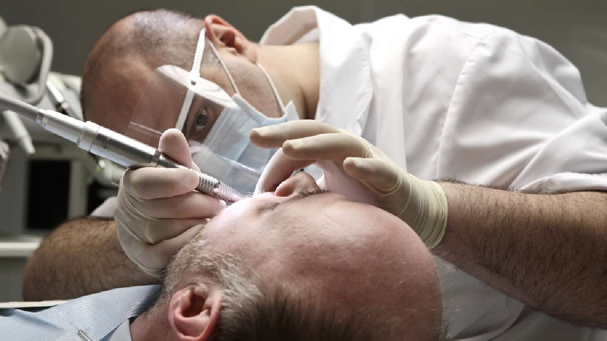 Implants or dentures? 6 facts to know before you decide
