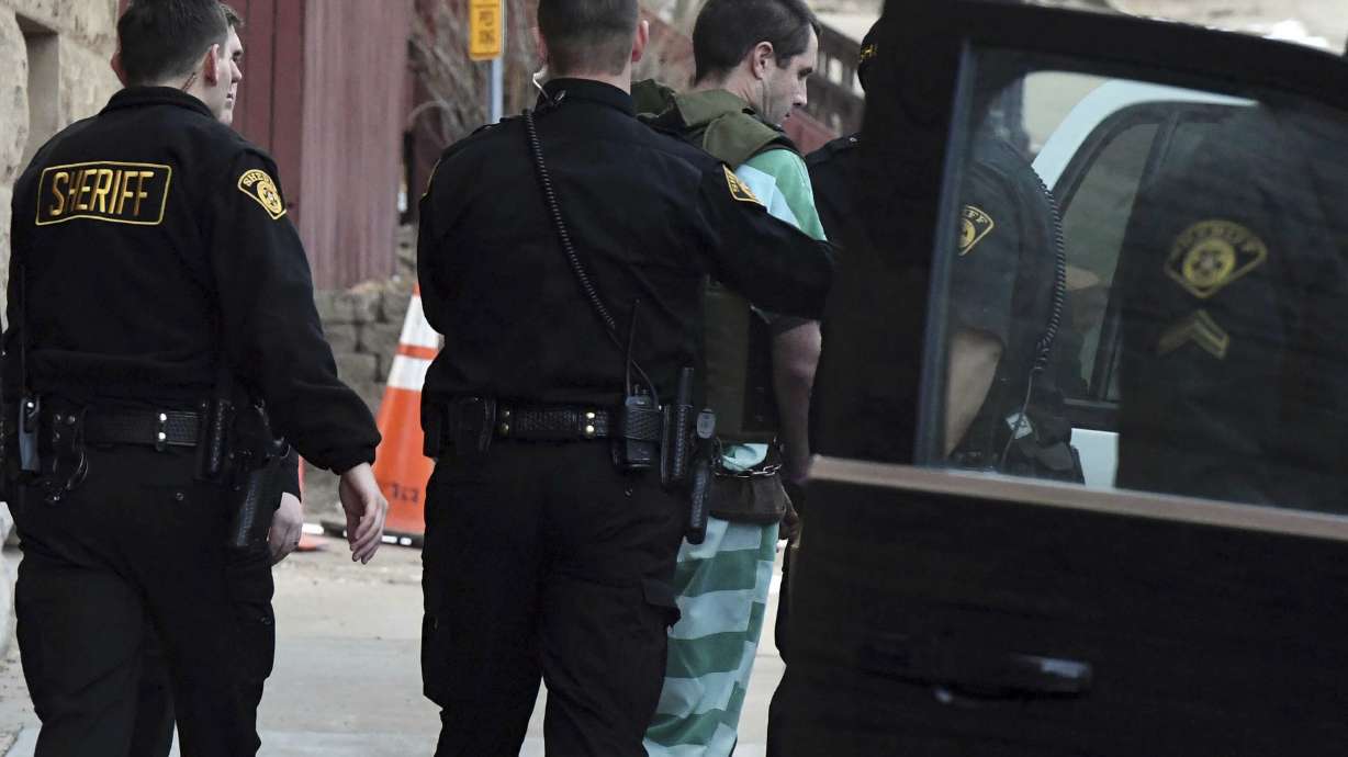 The Latest: Court records say 2 knew man wanted fiancee dead