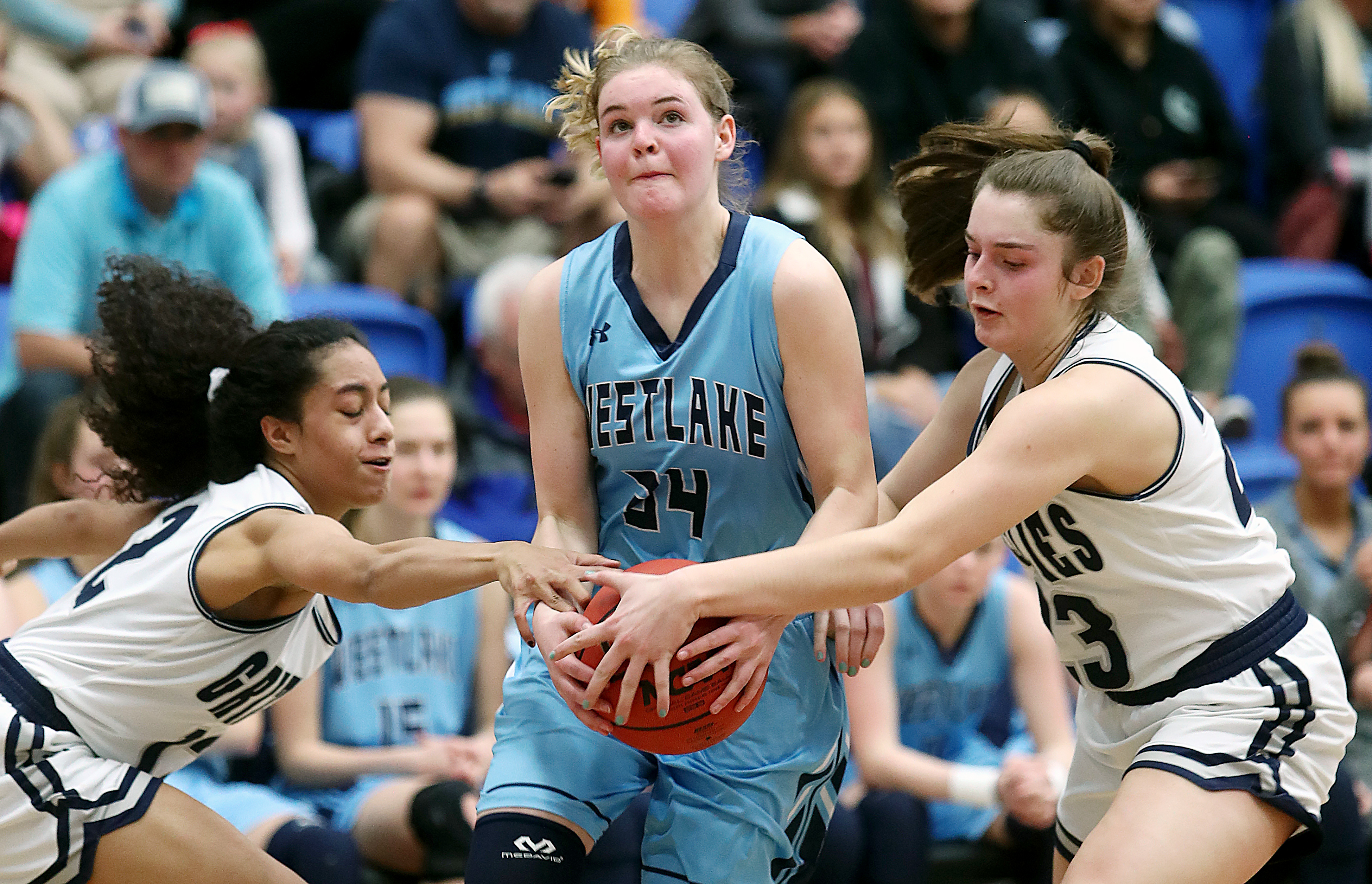 Copper Hills' Eleyana Tafisi, left, and Breaunna Gillen try to force a turnover against Westlake in 6A quarterfinal basketball action at Salt Lake Community College in Taylorsville on Wednesday, Feb. 20, 2019. (Photo: Scott G Winterton, Deseret News)