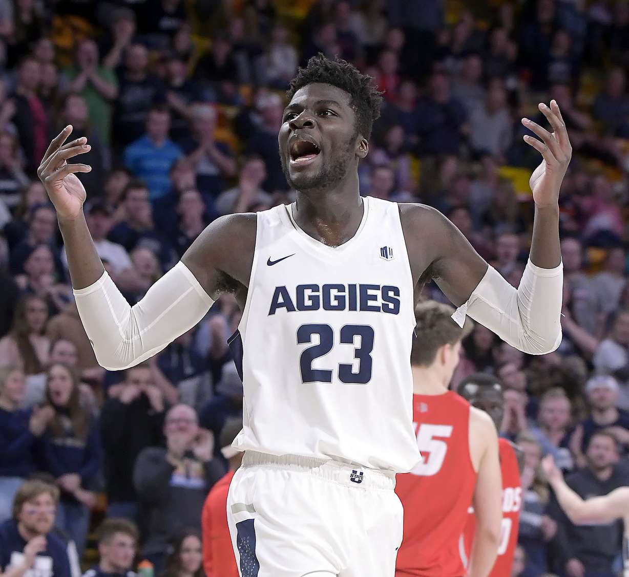 Utah State center Neemias Queta motions to the crowd after scoring a basket against New Mexico during an NCAA college basketball game, Feb. 20, 2019, in Logan. (Photo: Eli Lucero, The Herald Journal via AP)