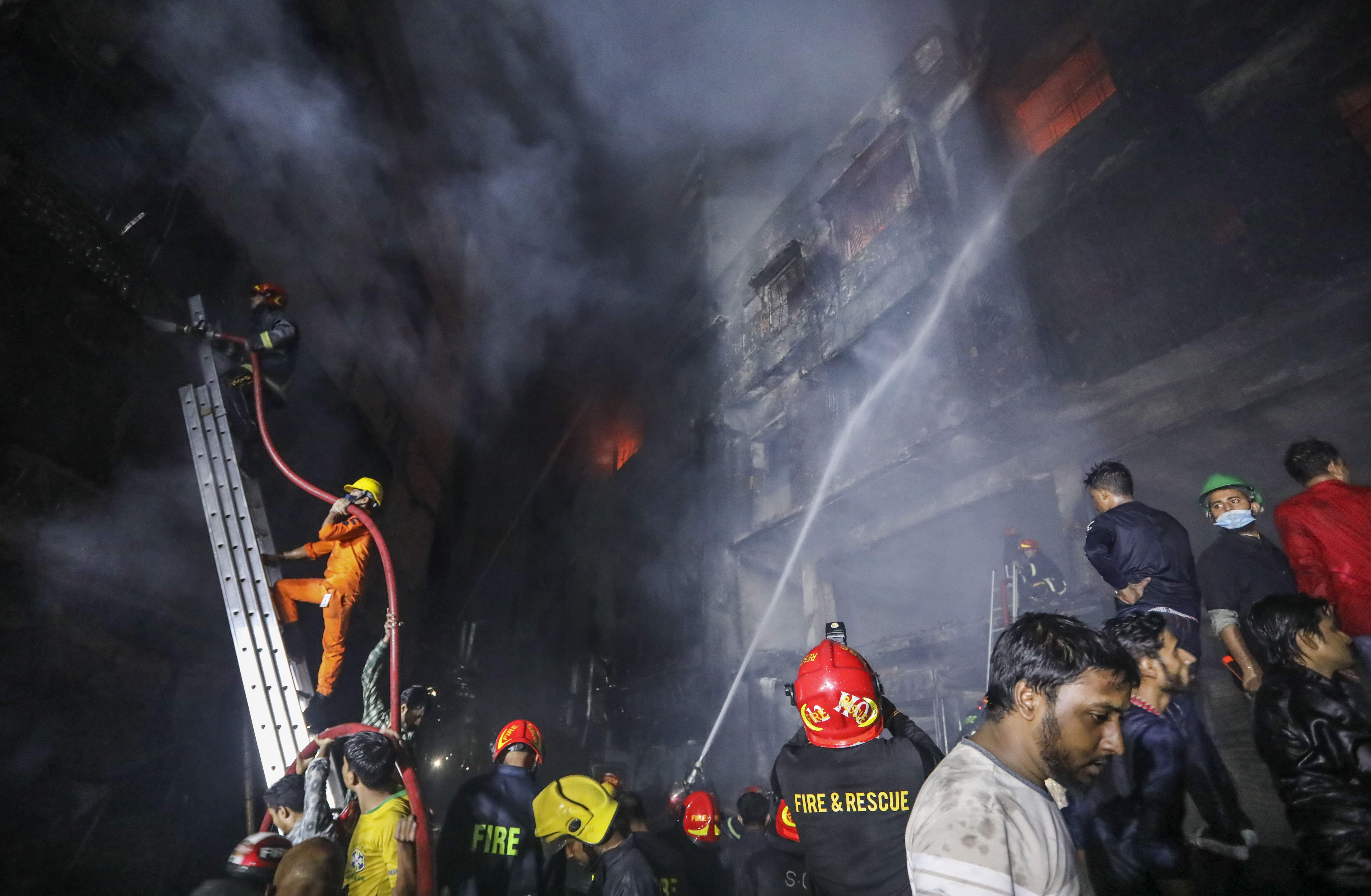 The Latest: Death toll in Bangladesh fire lowered to 67