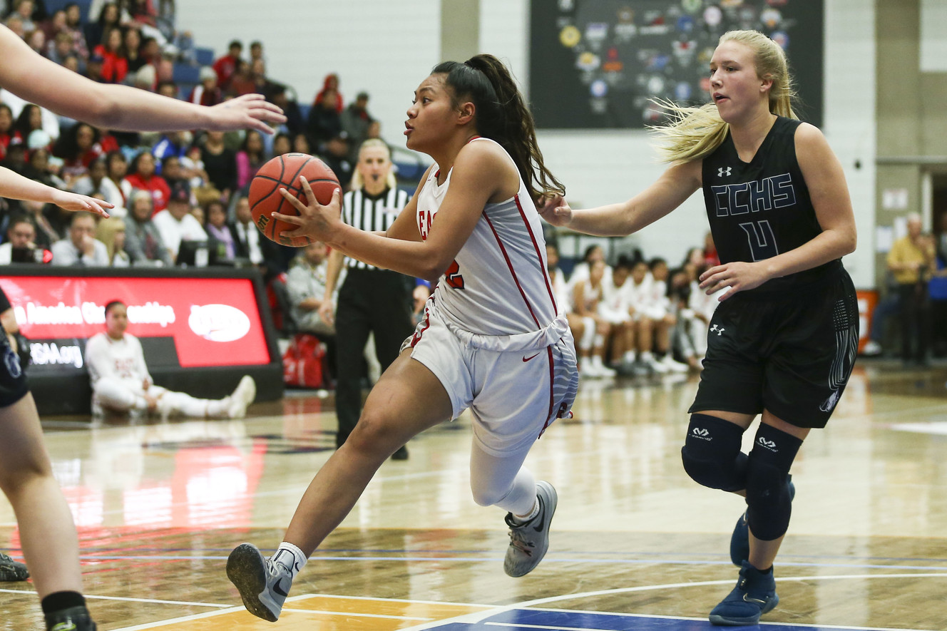 East's Margarita Satini (2) fakes a pass while driving to the hoop to score against the Corner Canyon during the 5A girls basketball championship at the Lifetime Activities Center in Taylorsville on Saturday, Feb. 23, 2019. (Photo: Silas Walker, Deseret News)