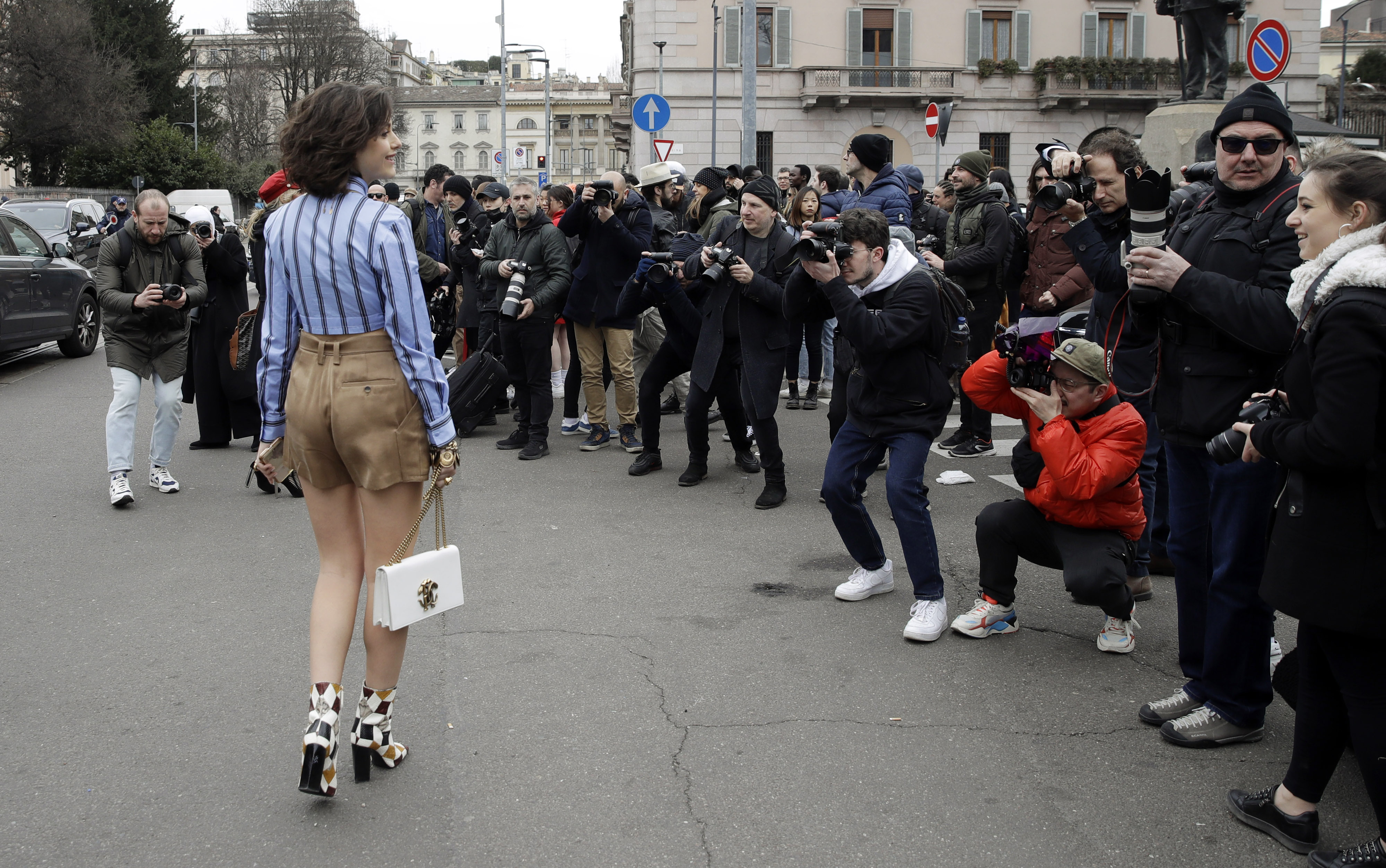 AP Photos: Vibrant Milan street fashion rivals runway shows