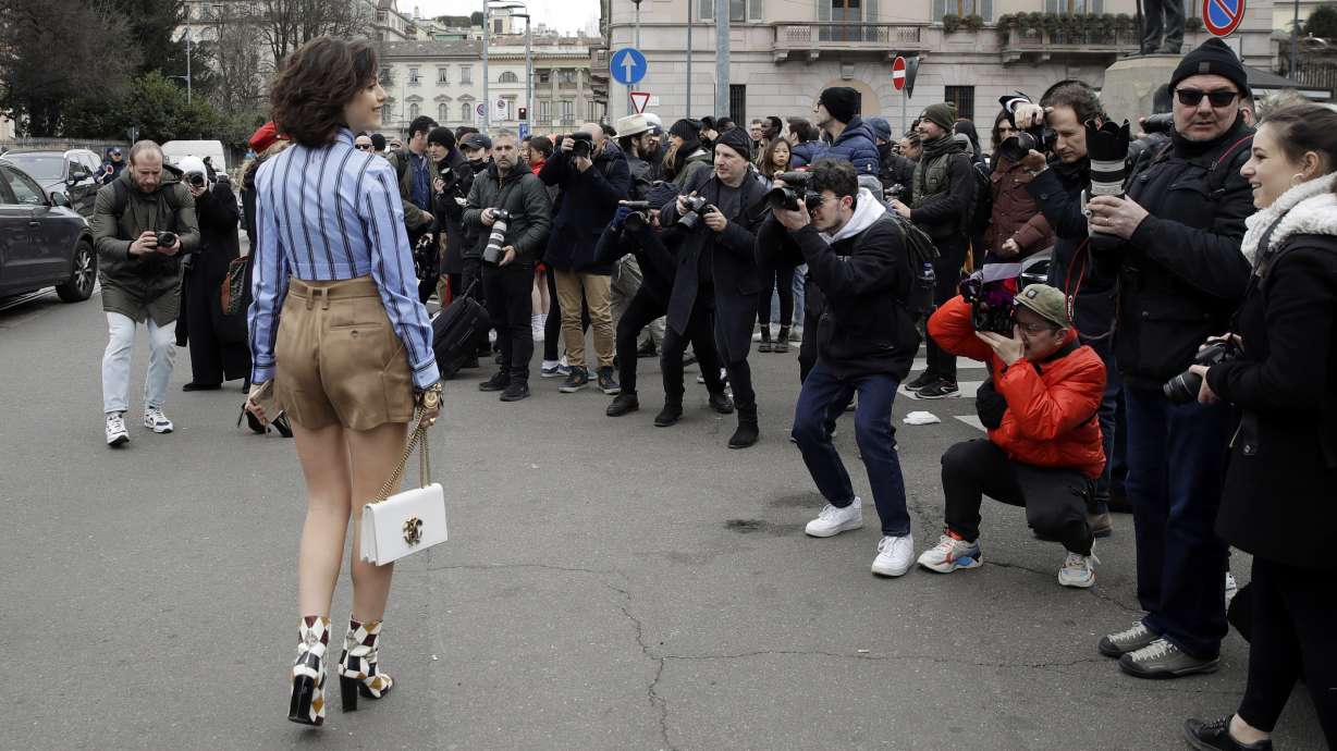 AP Photos: Vibrant Milan street fashion rivals runway shows