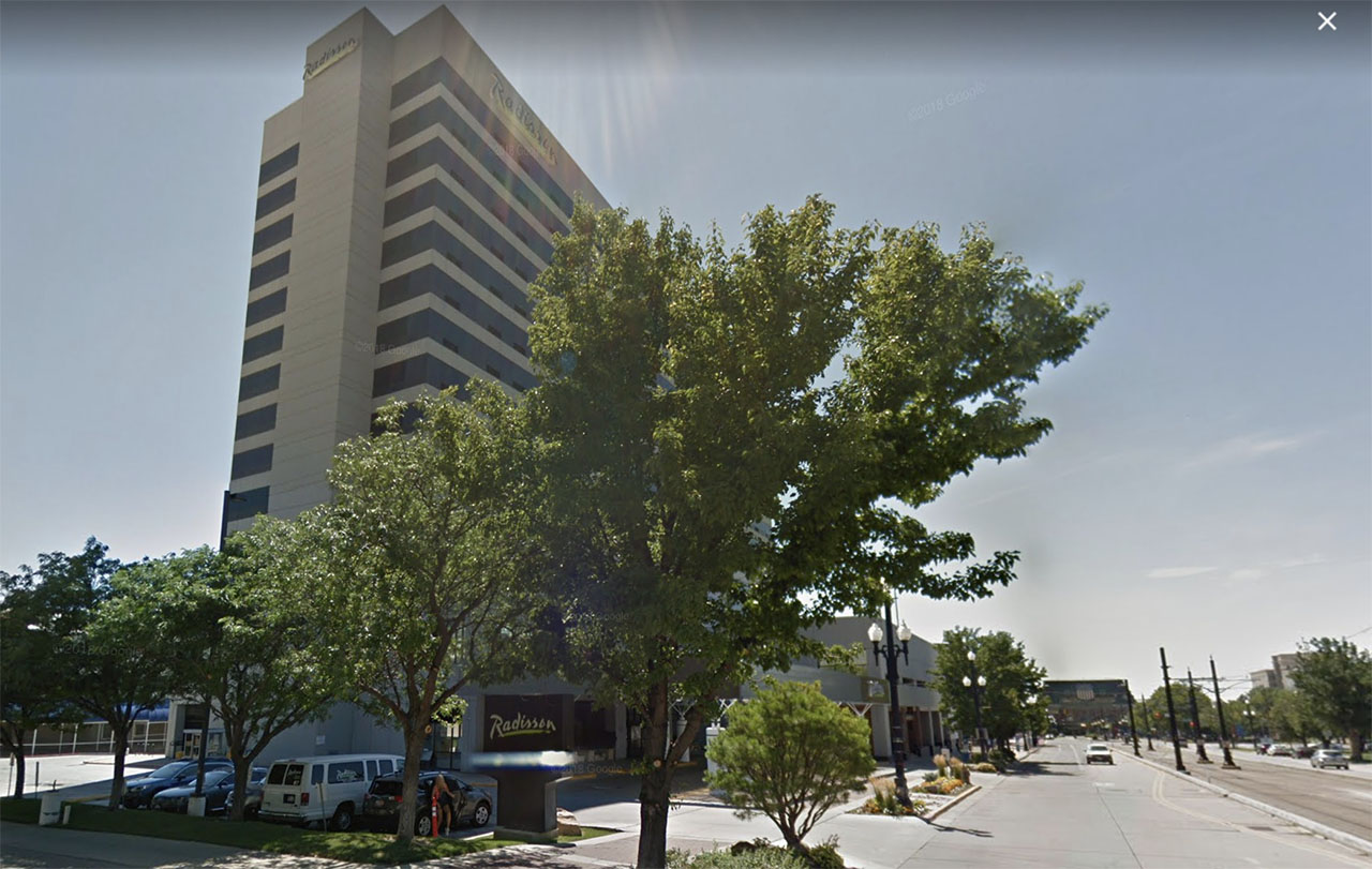 'Partying' man found passed out in Utah hotel with stolen gun, police say