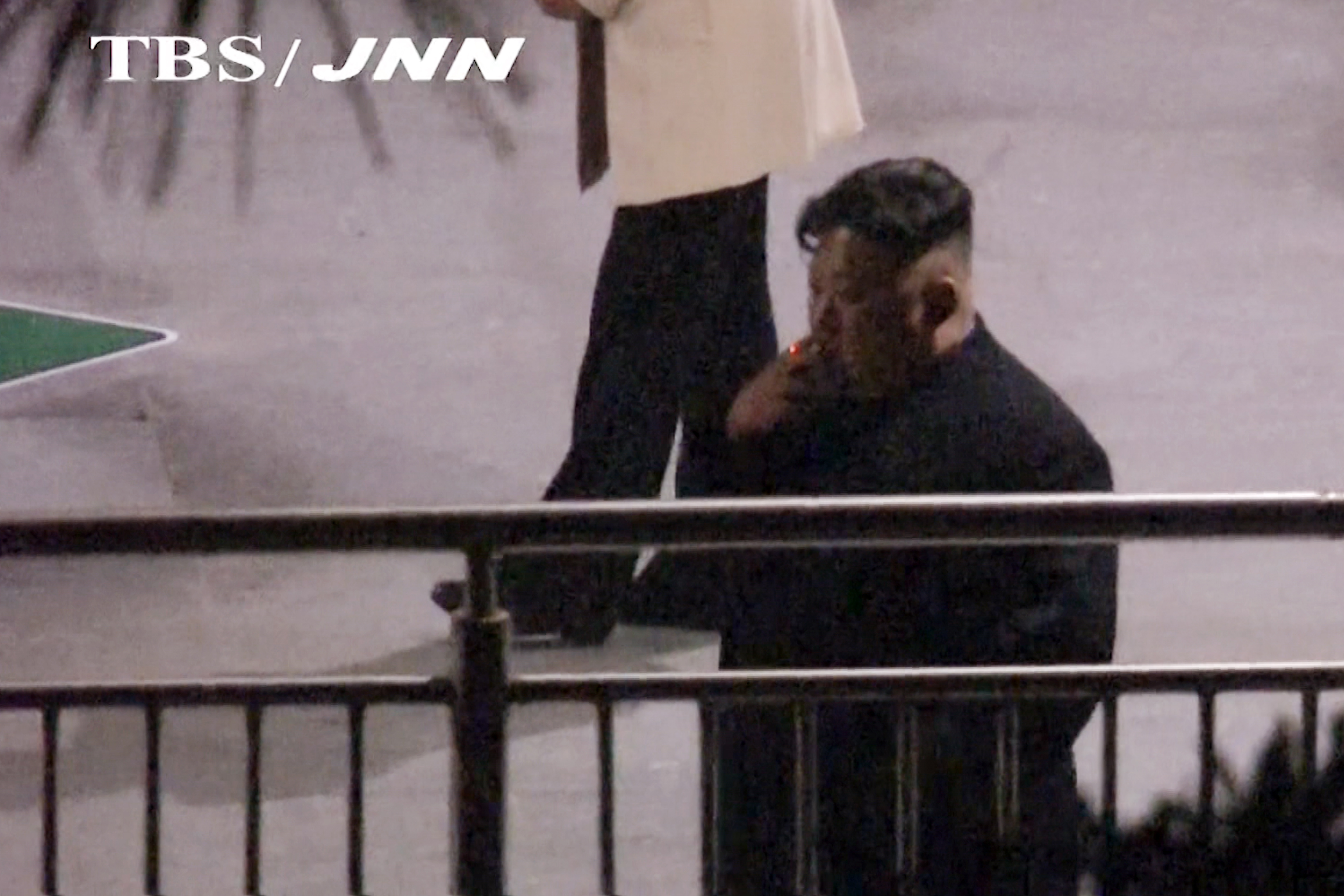 On his way to Vietnam, Kim Jong Un took an early smoke break