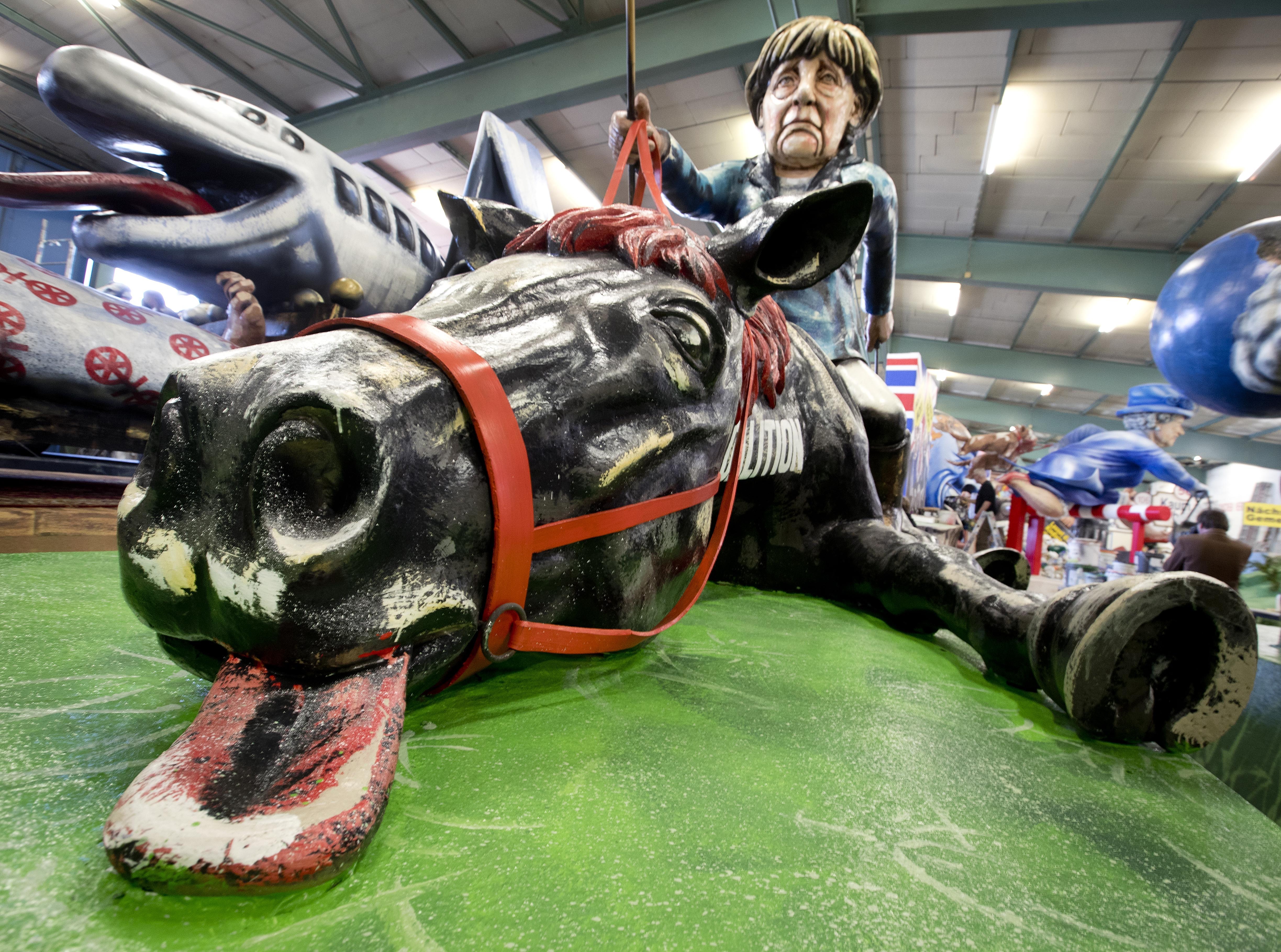 Trump, Merkel, queen all targets for German Carnival floats