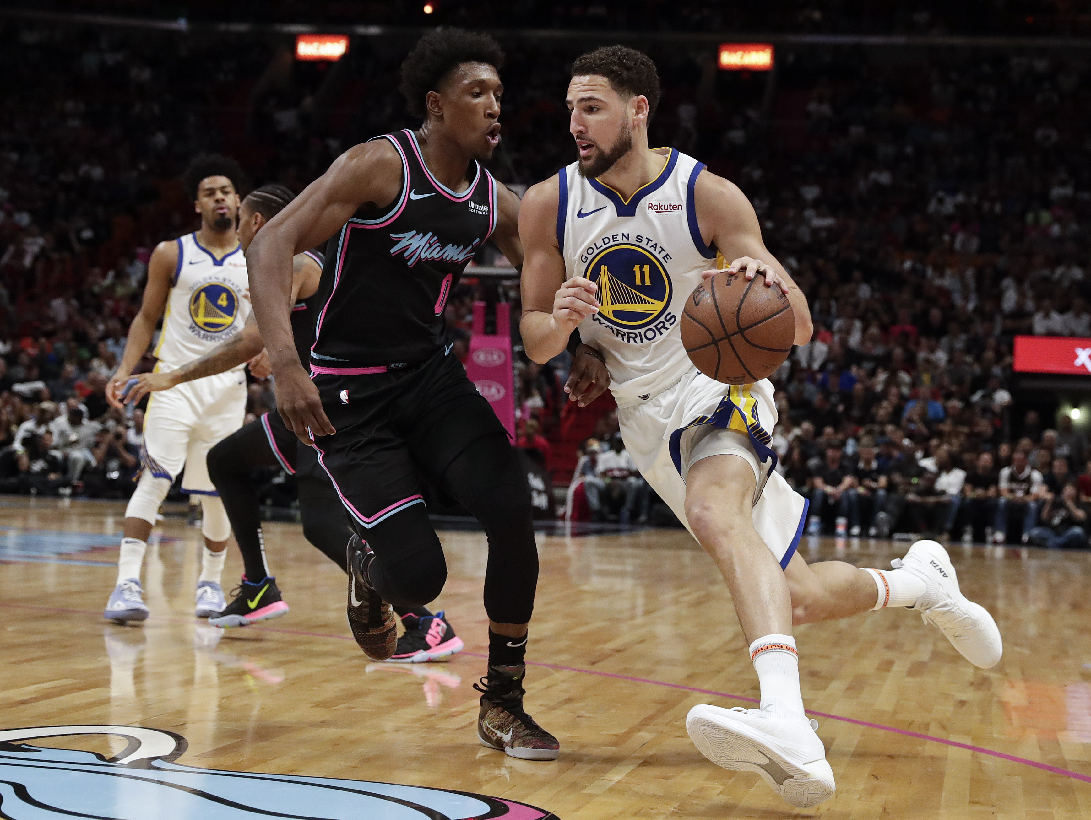 Wade banks in straightaway 3 to lift Heat past Warriors