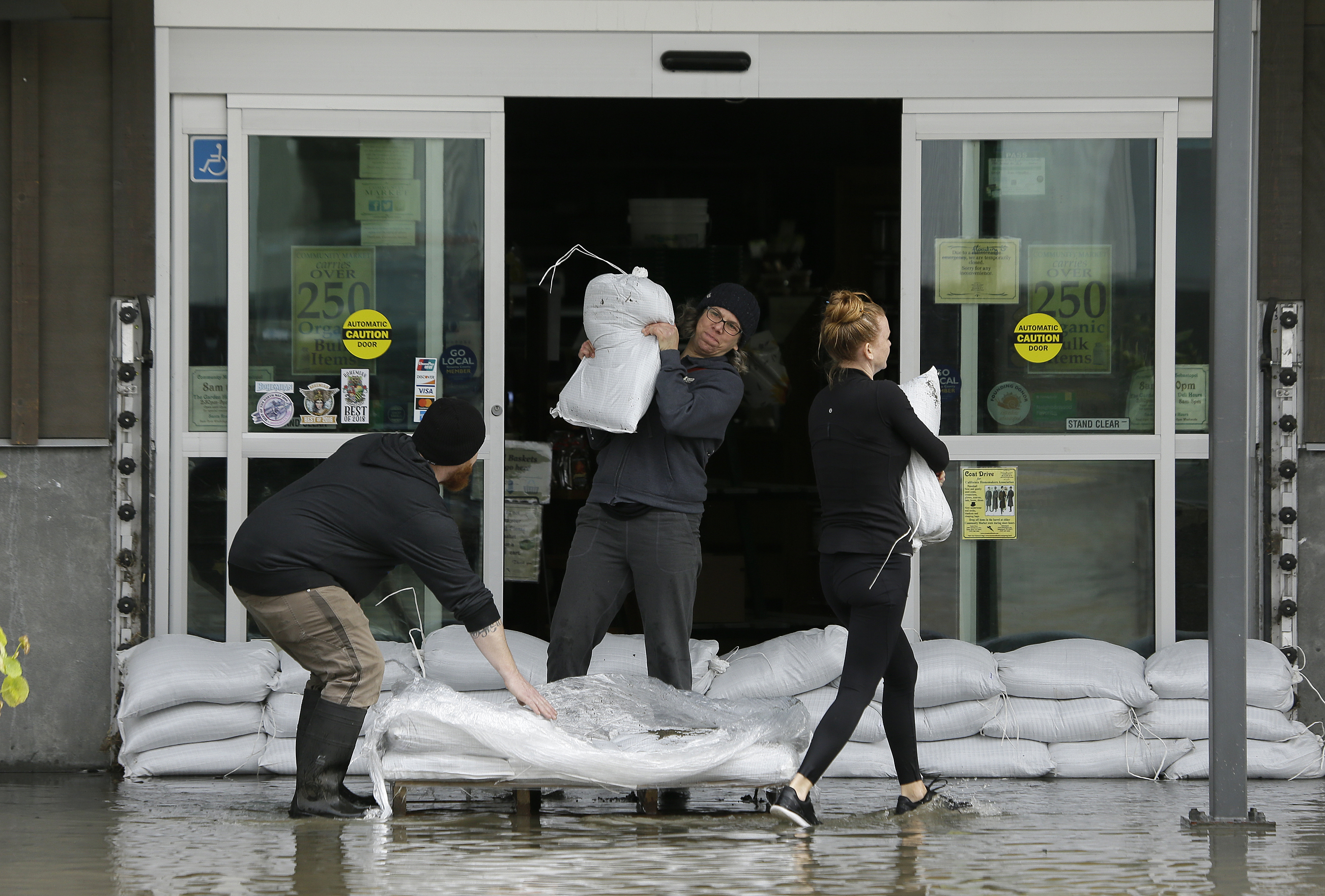California man swept away by flood trying to reach kids