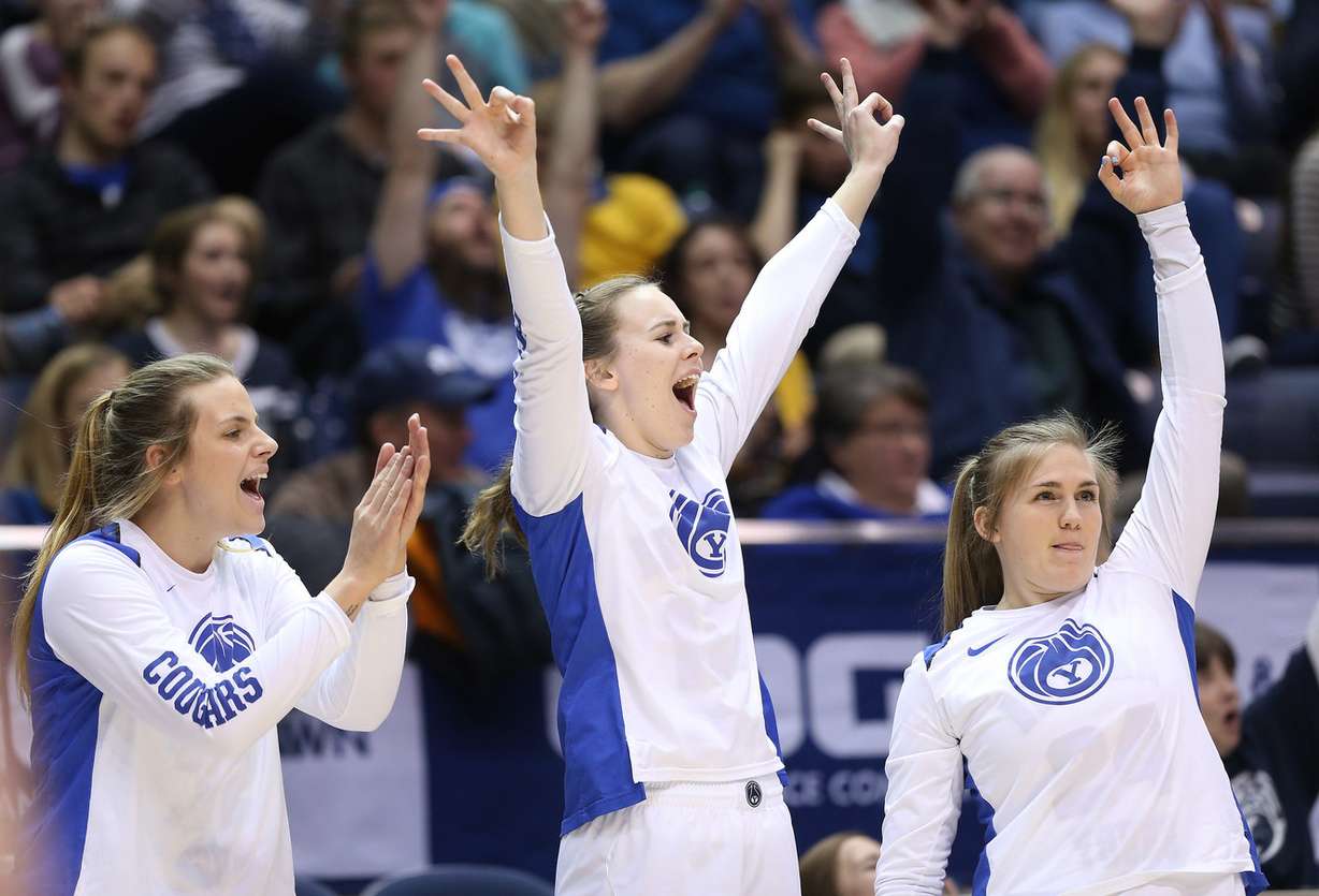 BYU Cougars forward Signe Glantz (32), BYU Cougars forward Abby Mangum (10) and BYU Cougars guard Ashley Beckstrand (24) celebrate a three pointer against San Francisco Dons in Provo on Thursday, Feb. 28, 2019. BYU 82-59. (Photo: Jeffrey D. Allred, KSL)