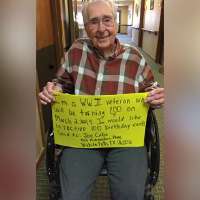 WWII vet asks for 100 cards on 100th birthday, receives thousands instead