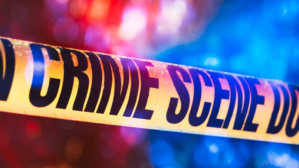 A woman who police say shot at officers was killed when the officers returned fire, and a man she was with was arrested for allegedly giving her a gun.