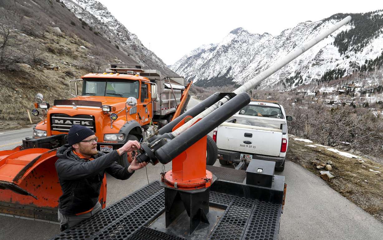 Steven Clark, avalanche forecaster for the Utah Department of Transportation, demonstrates how he uses an Avalauncher during a news conference on state Route 210 in the mouth of Little Cottonwood Canyon on Tuesday, March 5, 2019. Photo: Steve Griffin, KSL