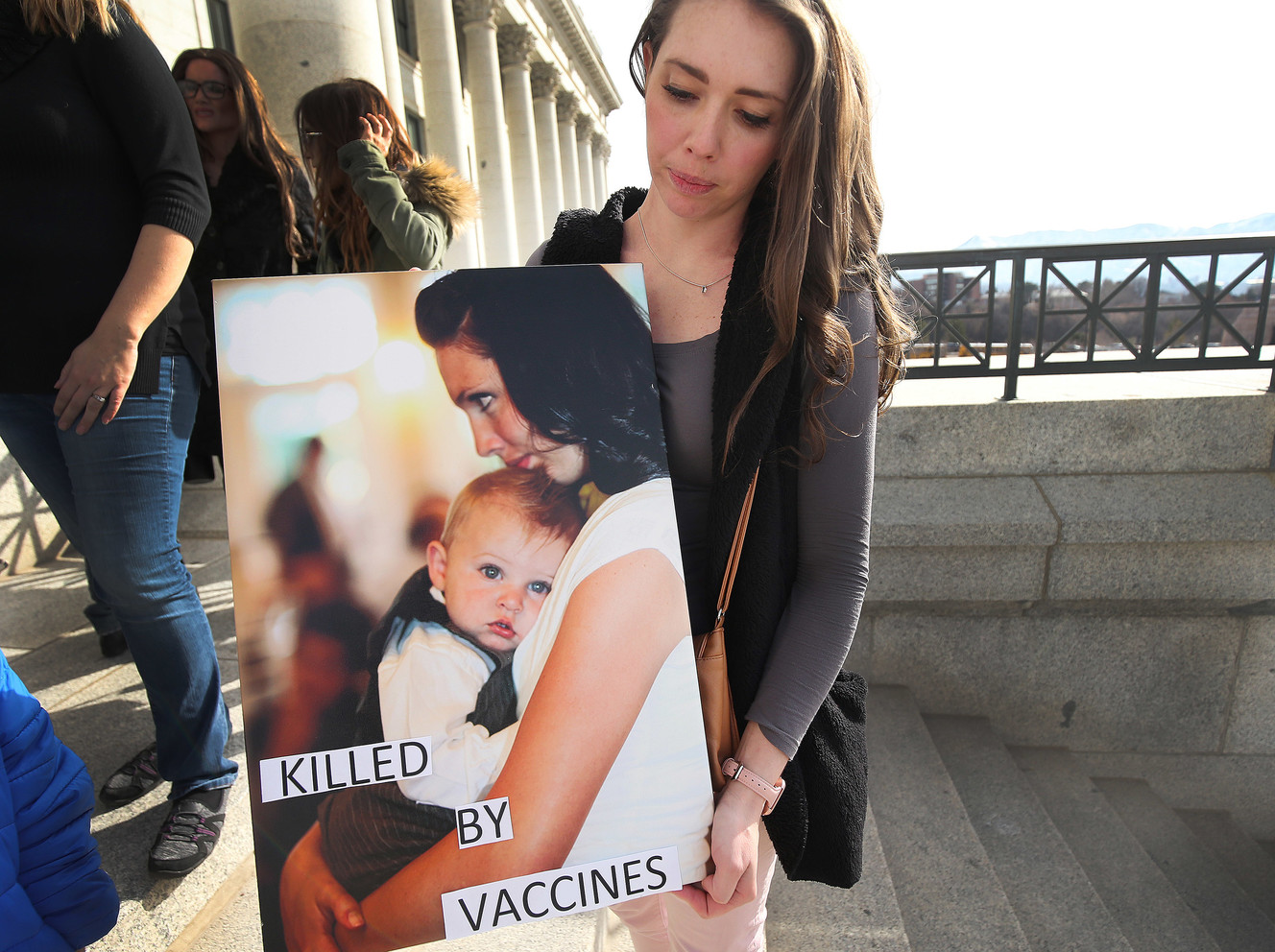 Krystle Cordingley holds a photo of her son, Corbyn, during a Your Health Freedom rally at the Capitol in Salt Lake City on Tuesday, March 5, 2019. Corbyn died after receiving the flu vaccine . (Photo: Jeffrey D. Allred, KSL)