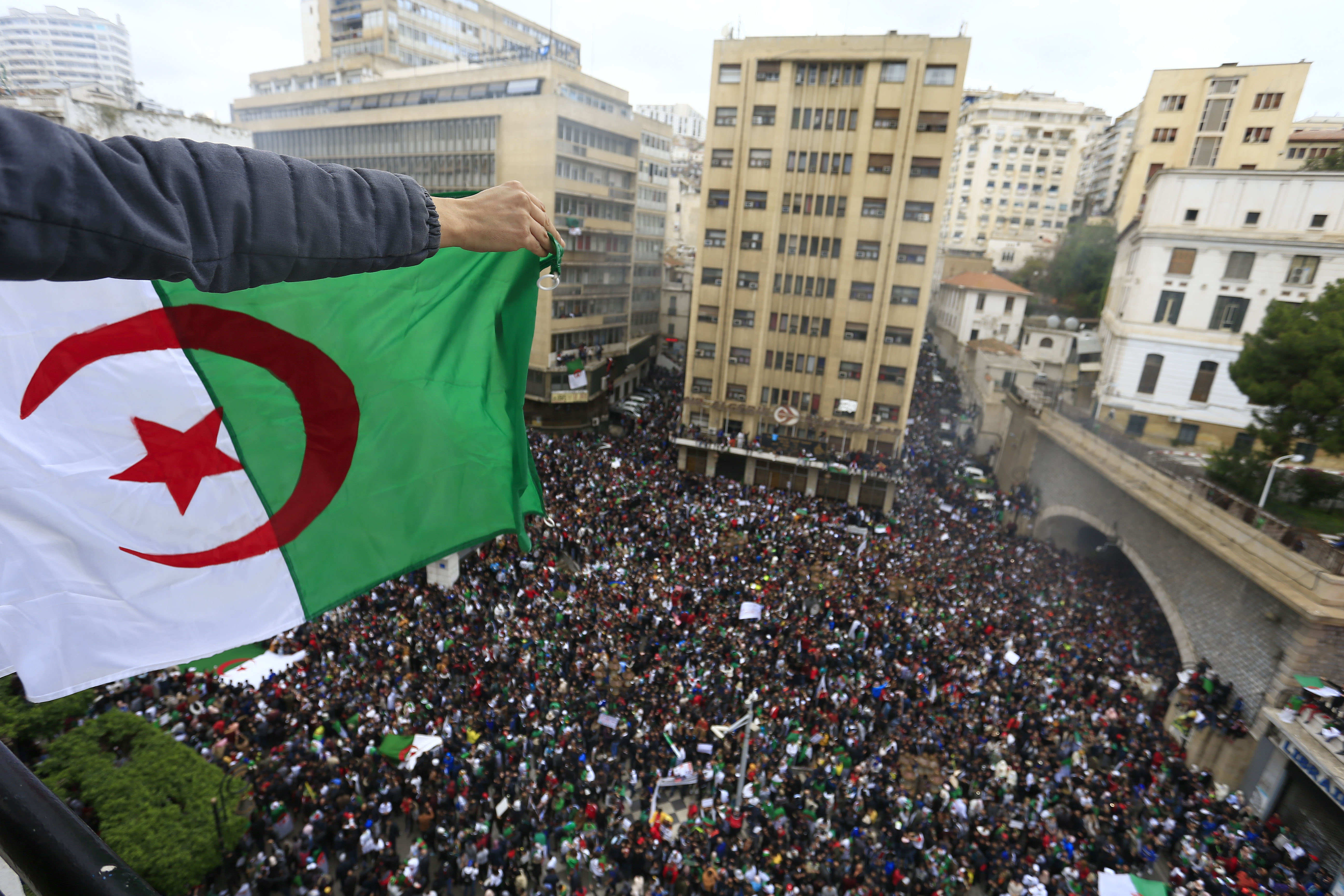 Algerian president back home amid mass protests against him