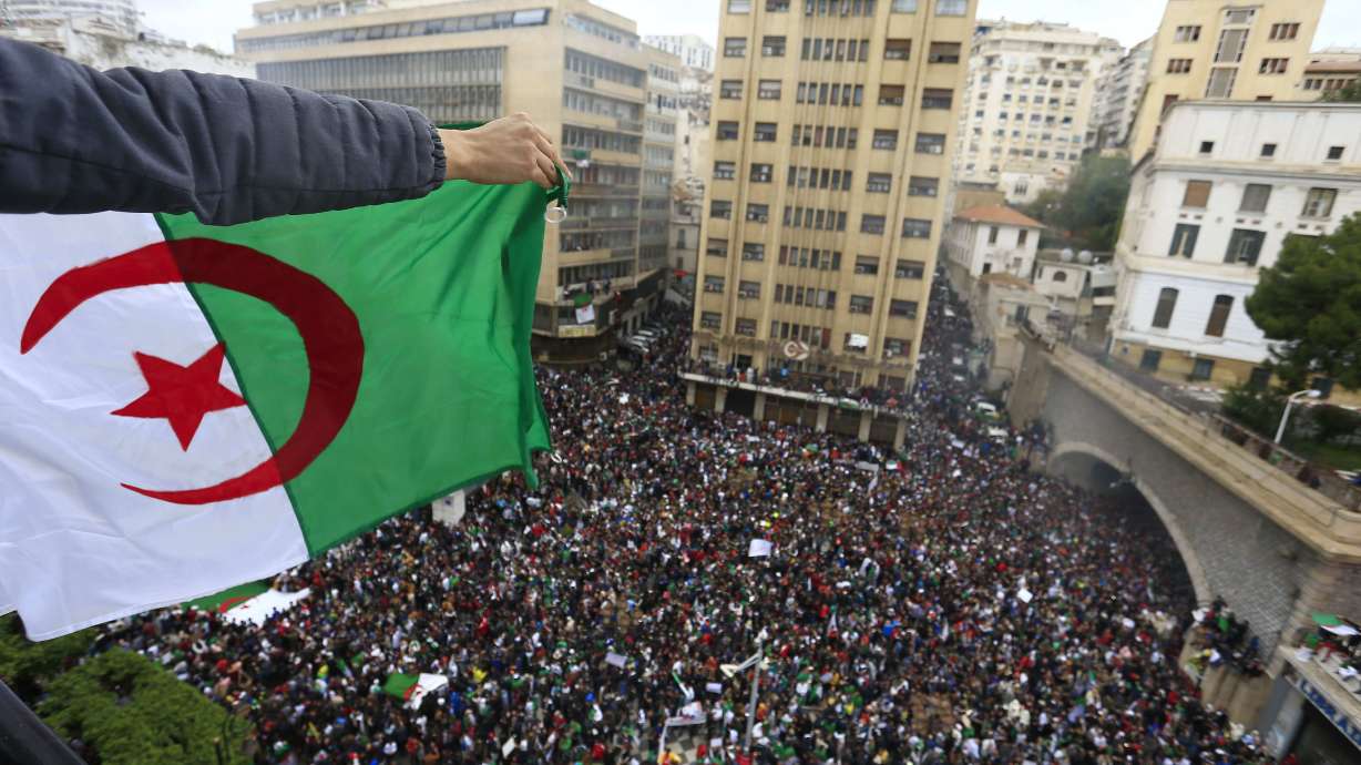 Algerian president back home amid mass protests against him