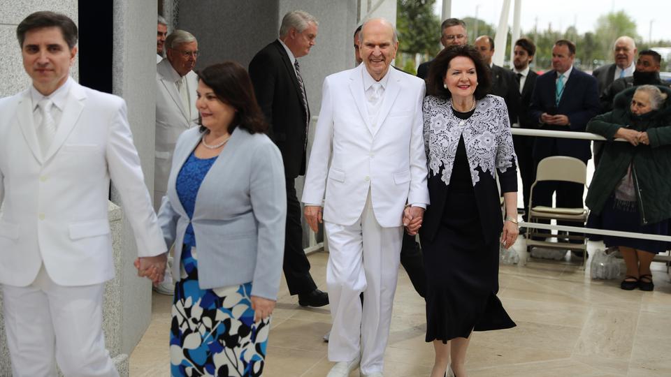 President Russell M. Nelson and his wife, Wendy, exit the Rome Italy Temple to conduct the traditional cornerstone ceremony prior to the first dedicatory session on Sunday, March 10, 2019; Intellectual Reserve, Inc.