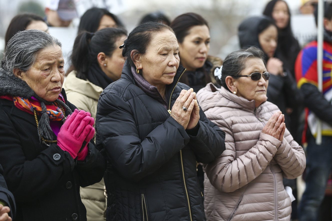 Tibetans says prayers and sing songs during a rally to commemorate the 60th anniversary of resistance to illegal occupation by Chinese government forces in Tibet on March 10, 1959 in Salt Lake City on Sunday, March 10, 2019. (Photo: Silas Walker, KSL)