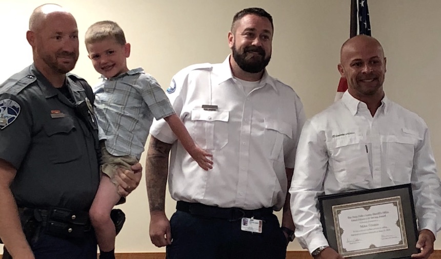 Mike Coonce was honored by the Twin Falls County Sheriff’s Office for his actions in saving 4-year-old Chance McGrath. (Courtesy photo via EastIdahoNews.com)
