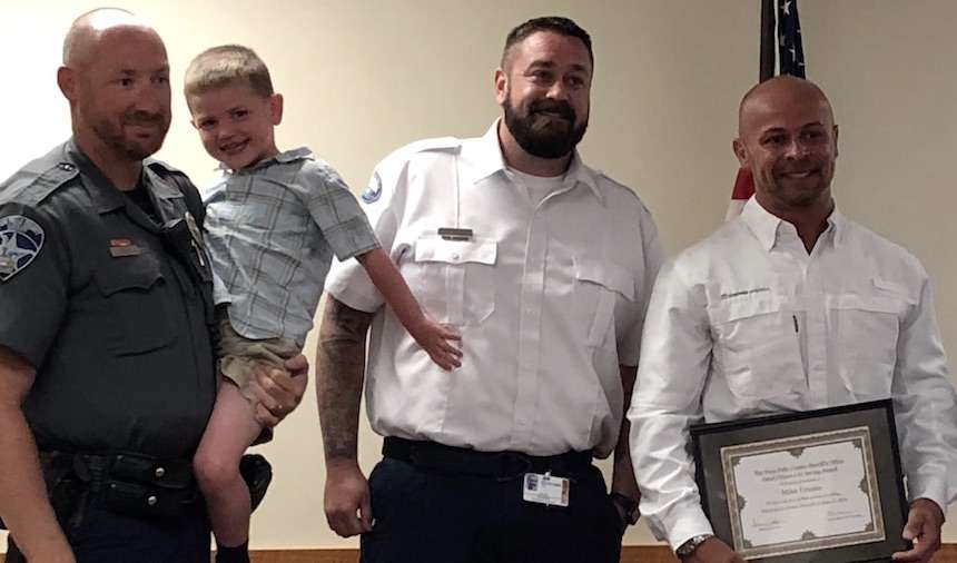 Mike Coonce was honored by the Twin Falls County Sheriff’s Office for his actions in saving 4-year-old Chance McGrath. (Courtesy photo via EastIdahoNews.com)