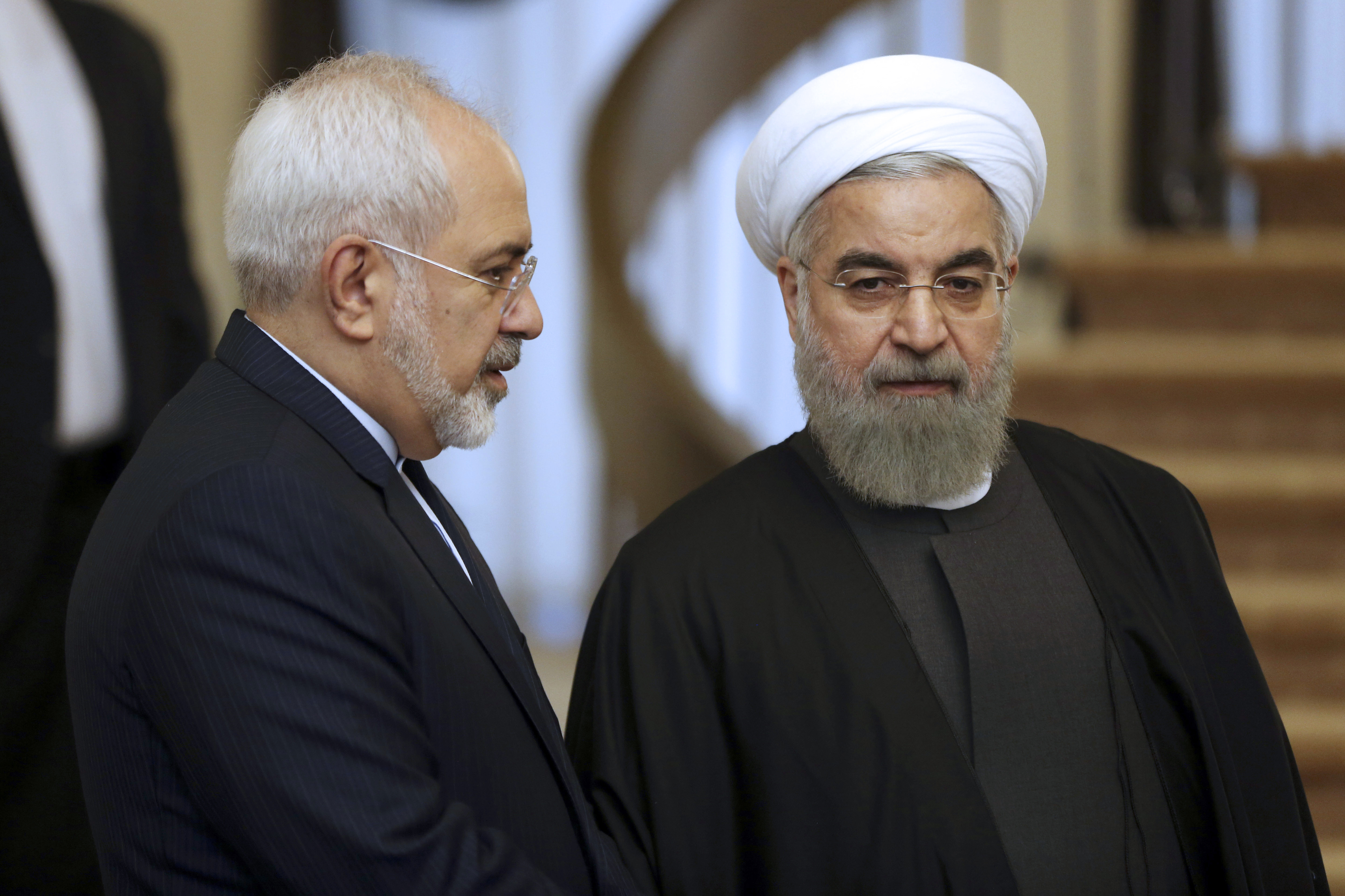 Iran's Rouhani seeks to boost ties on first visit to Baghdad
