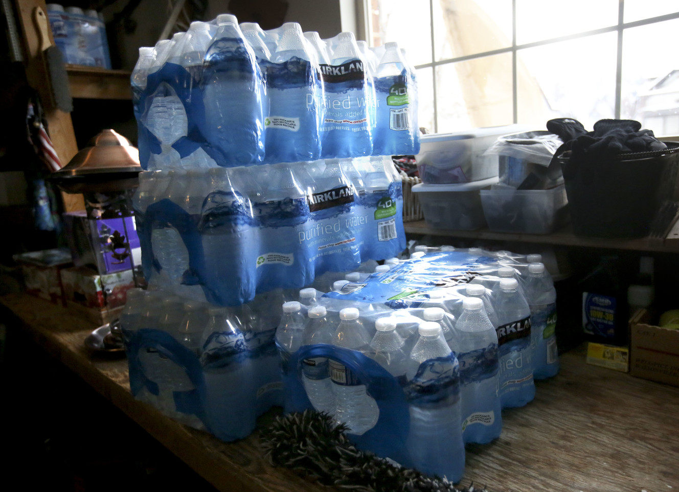 Packages of bottled water are pictured at the home of Kathe Bolan in Sandy on Thursday, March 14, 2019. Bolan's water is contaminated with elevated levels of lead and copper. (Photo: Kristin Murphy, KSL)