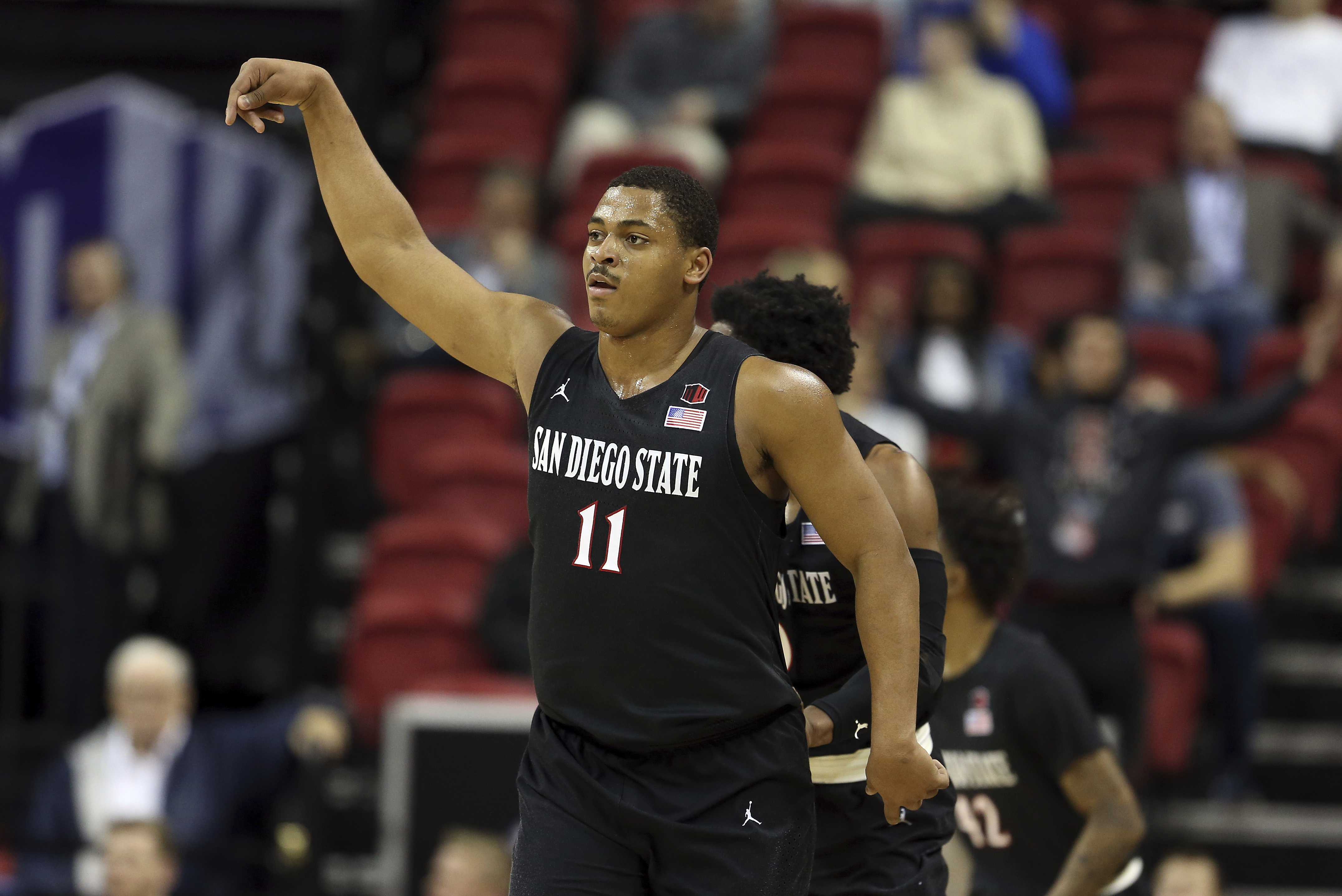 San Diego State's Matt Mitchell reacts after sinking a 3-point shot during the first half of the team's NCAA college basketball game against Nevada in the Mountain West Conference men's tournament Friday, March 15, 2019, in Las Vegas. (Photo: Isaac Brekken, AP)