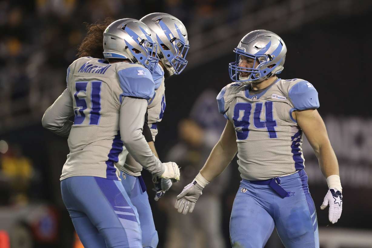 Karter Schult (94) led the Stallions' defense to a second-half shutout of the Express with five tackles and two sacks. (Photo: Peter Joneleit, AP)