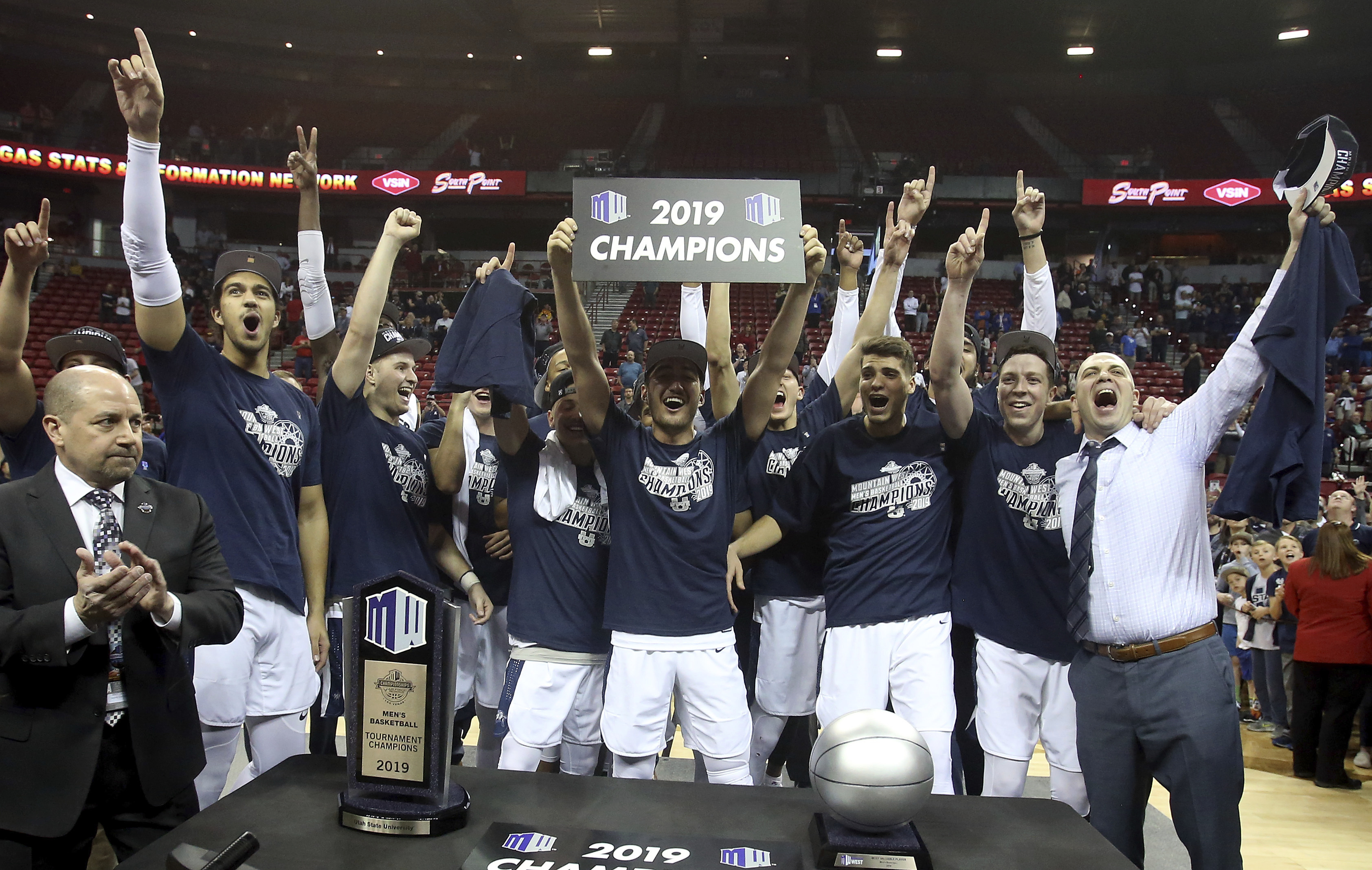 Utah State celebrates after defeating San Diego State following an NCAA college basketball game in the Mountain West Conference men's tournament championship Saturday, March 16, 2019, in Las Vegas. (Photo: Isaac Brekken, AP)