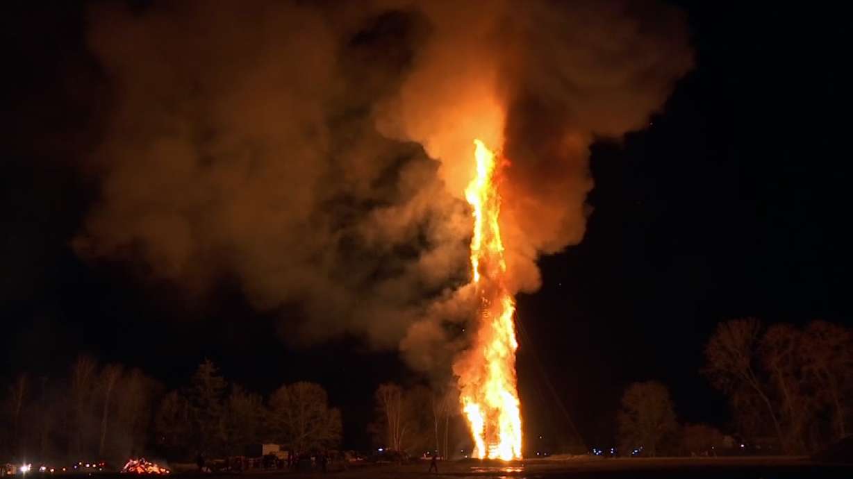 Austrian town claims tallest bonfire after 3 months' work