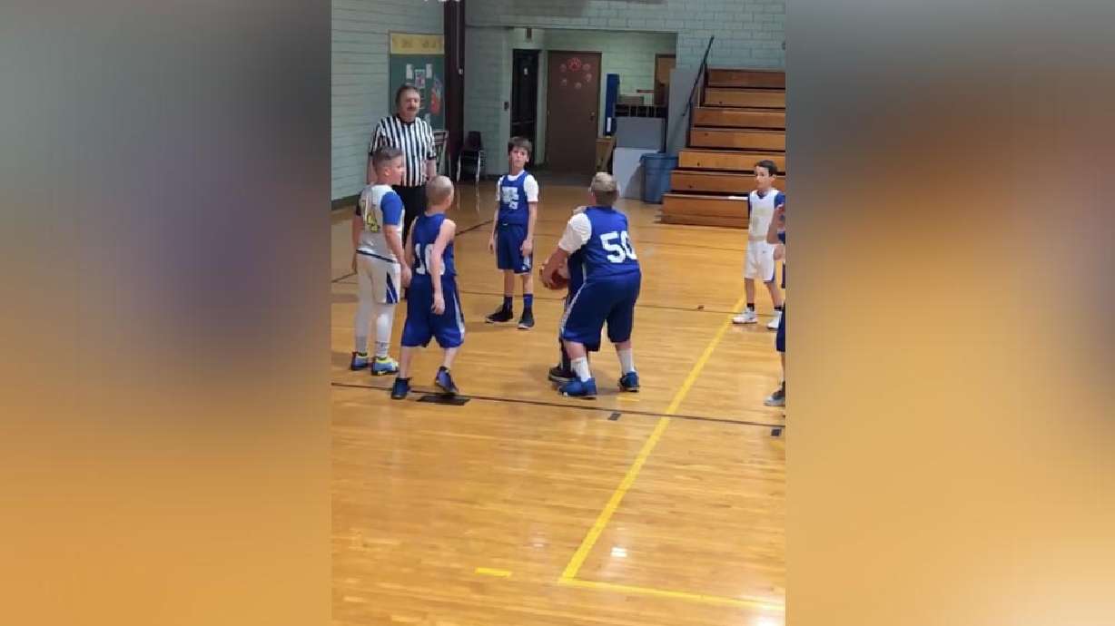 Have You Seen This? Young basketball player helps teammate score