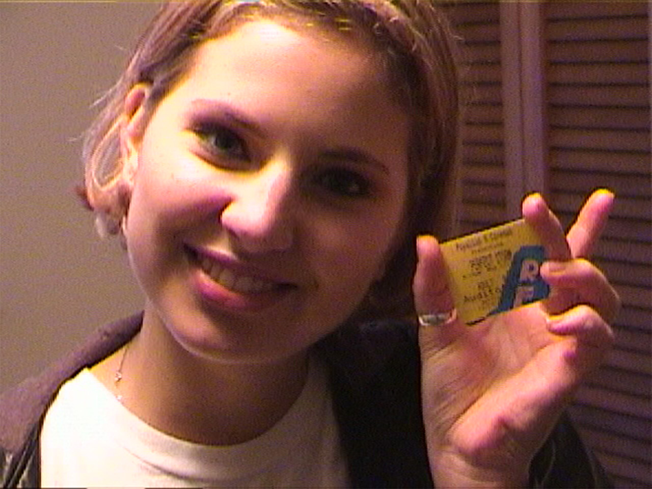 This undated still image shows Susan Cox displaying the movie ticket stub from from her first date with Josh Powell in November 2000. (Photo: Unknown)