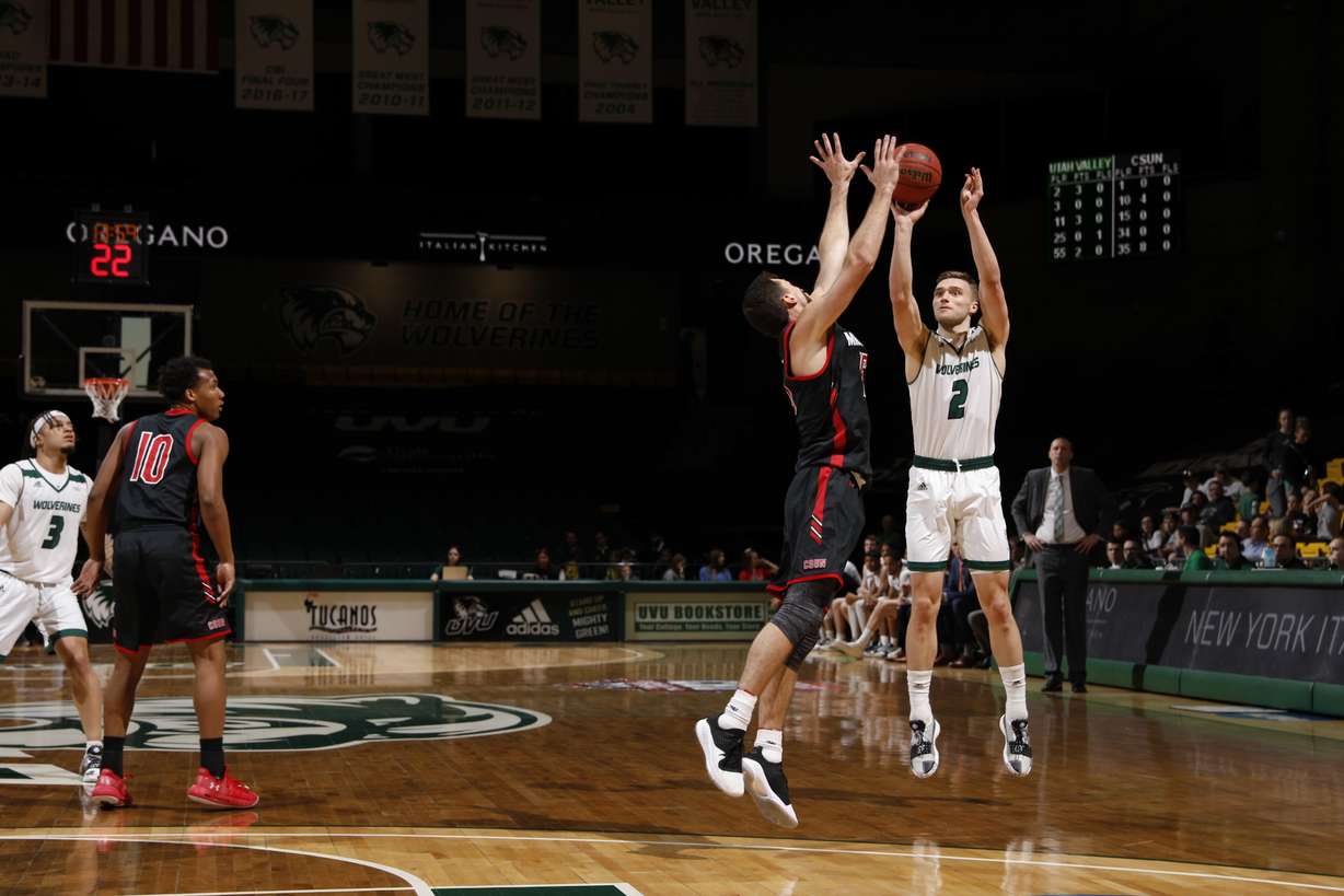 Utah Valley's Jake Toolson puts up a shot during the Wolverines' 92-84 win over CSU Northridge in the opening round of the 2019 College Basketball Invitational, Tuesday, March 19, 2019 in Orem, Utah.