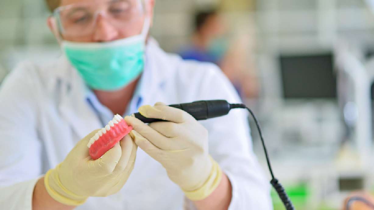 Pros and cons of implants and 2 types of dentures