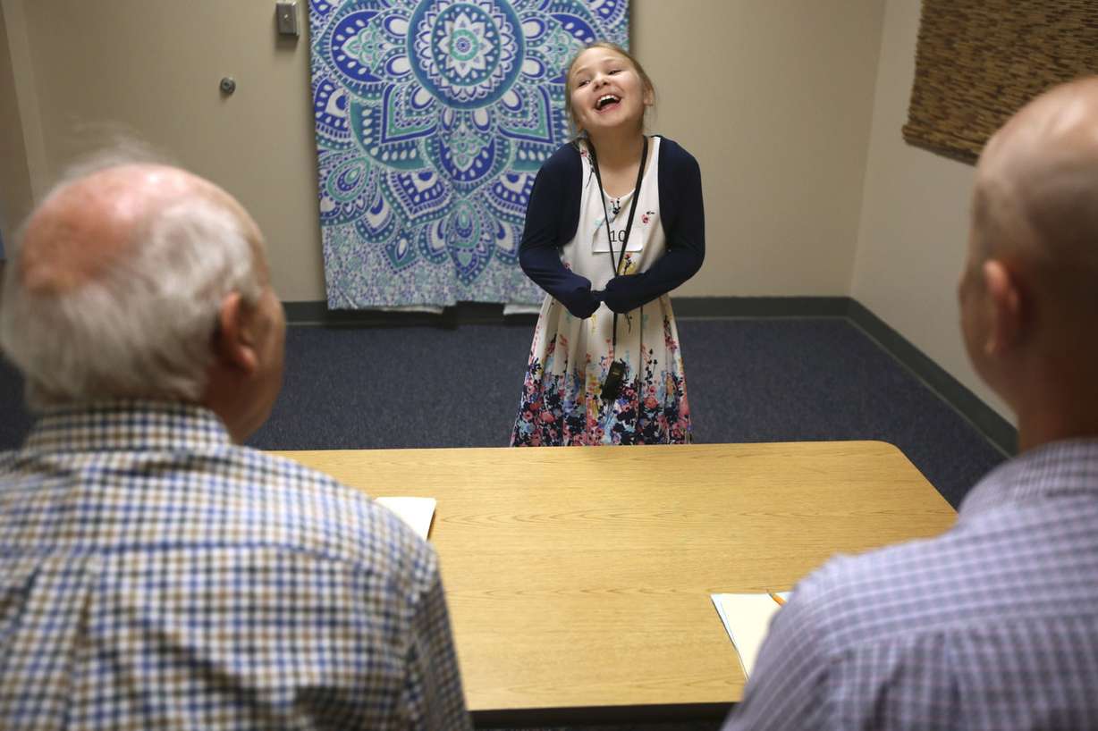 Stori Dempsey, first-grader at Whitesides Elementary School, talks to judges during the Amazing Shake, a social skills competition designed to teach kids how to conduct a proper handshake, have a conversation and think on their feet, at Layton Elementary School in Layton on Wednesday, March 20, 2019. (Photo: Kristin Murphy, KSL)