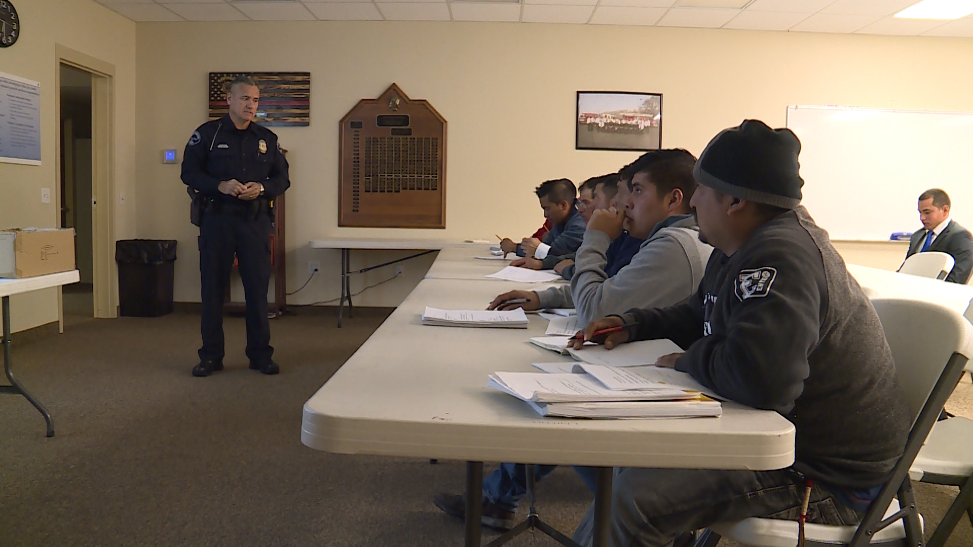Santaquin police officer Manny Escoto teaches a driving class in Spanish to a group from Mexico who found work in the many farms and orchards in and around Santaquin. (Photo: KSL TV)