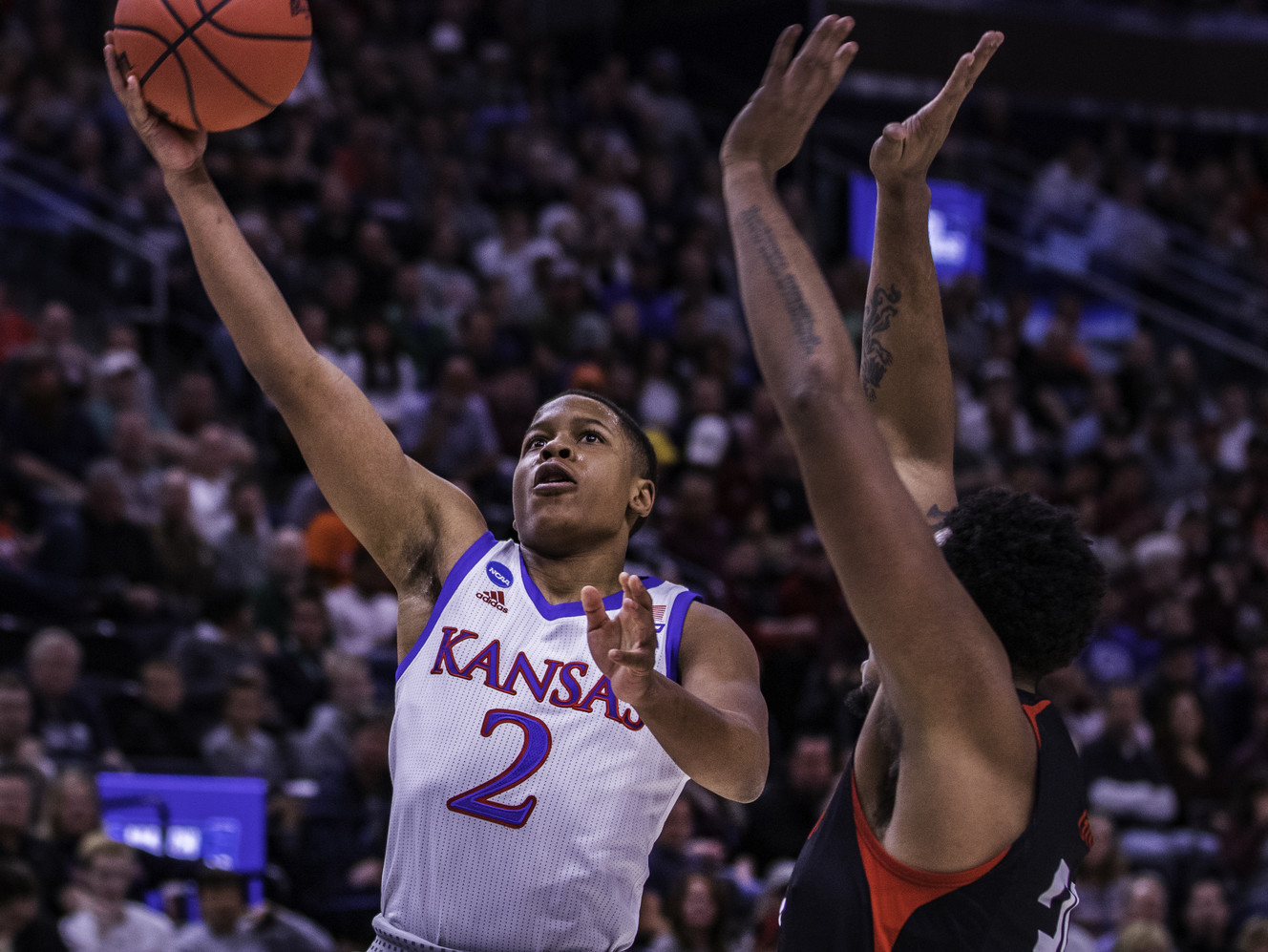 Kansas guard Charlie Moore goes up for a layup during Kansas's 87-53 win in the first round of the NCAA men's basketball tournament at the Vivint Arena on Thursday, March 21, 2019. (Photo: Carter Williams, KSL.com)