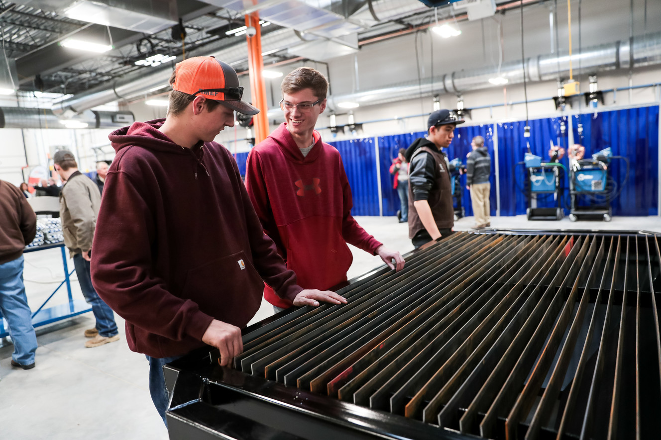 Jayce Cook and Brayden Taylor check out an oxy-fuel cutting table, which they helped build, at the opening of the new Welding Technology Building at Uintah Basin Technical College in Roosevelt on Thursday, March 21, 2019. Cook and Taylor are both students at Union High and are enrolled in classes at UBTech. (Photo: Spenser Heaps, KSL)